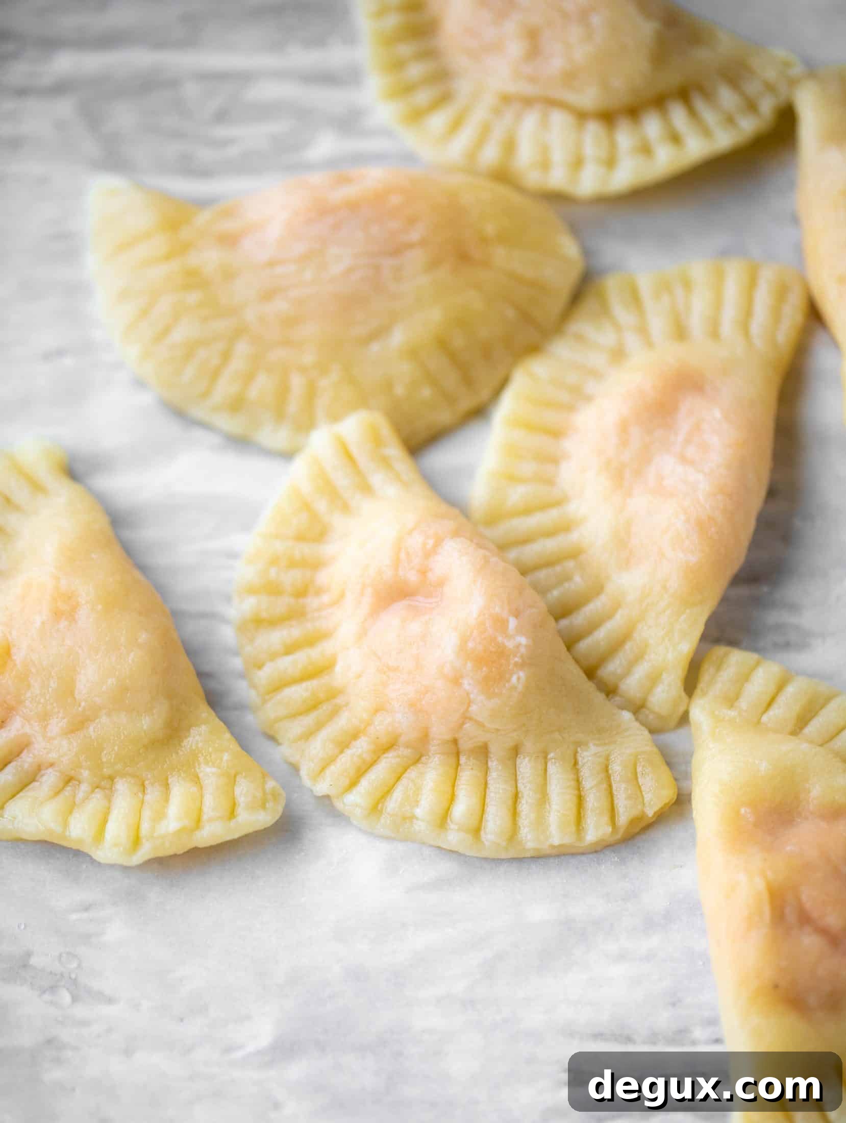 Sweet Potato and Fontina Pierogies with Brown Butter Sauce 6 just boiled pierogi