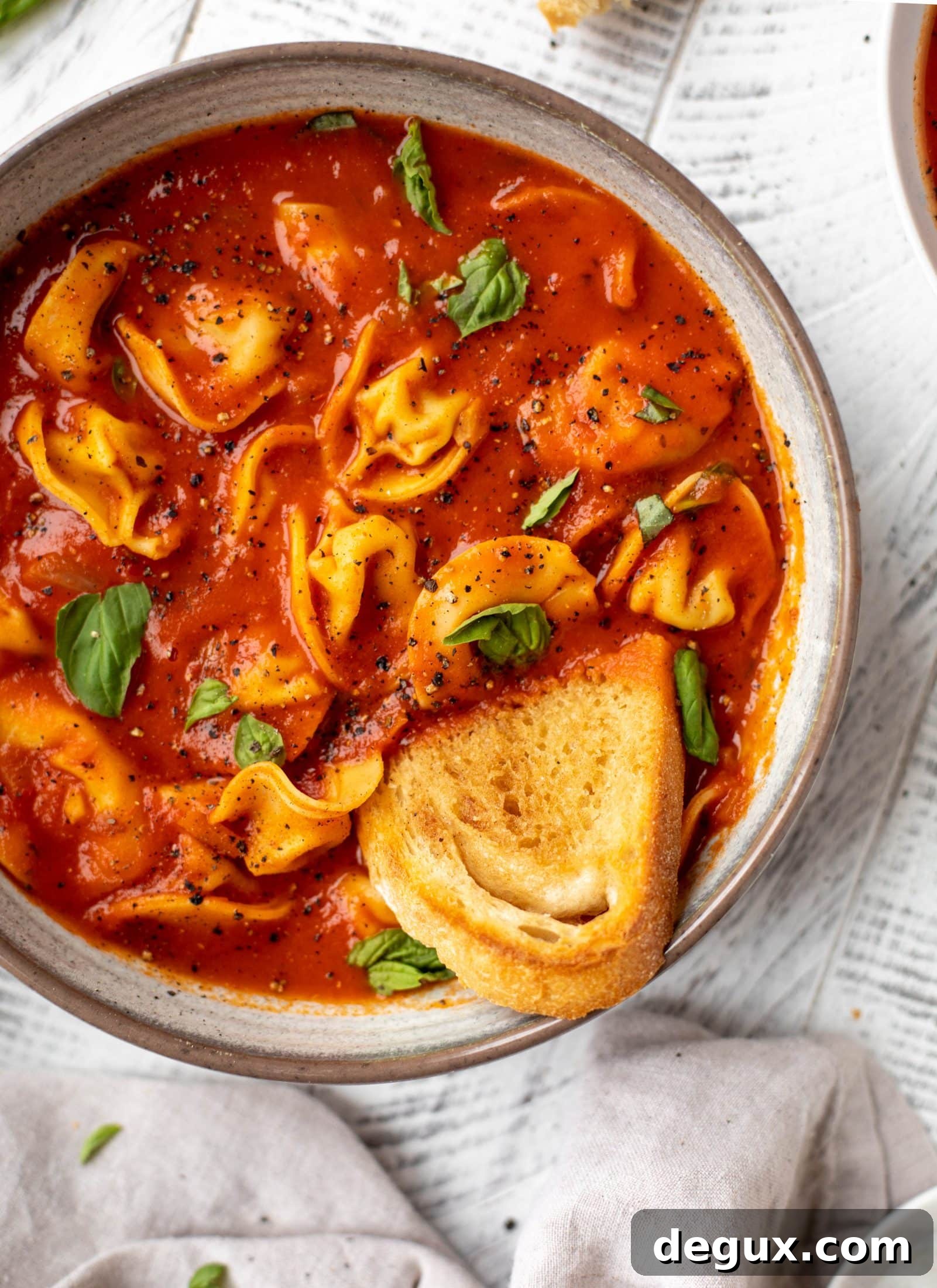 Curried Tomato Tortellini Soup with Brown Butter Garlic Toast Recipe 8 This curried tomato tortellini soup has so much flavor! Serve with cheesy tortellini and brown butter garlic toasts for the perfect weeknight meal.