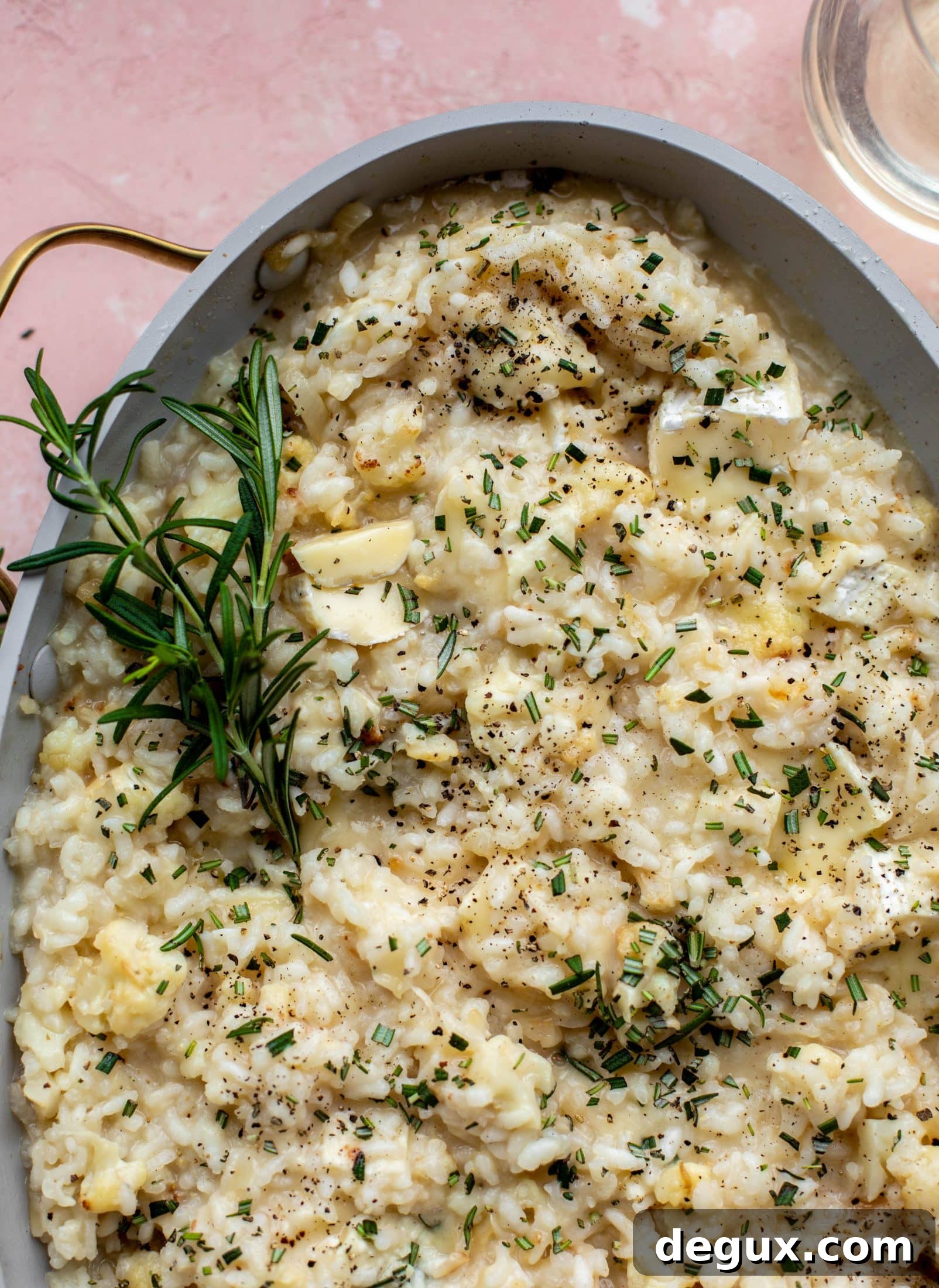 This baked risotto is delicious and so much easier than the stovetop version! Toasted cauliflower, brie cheese and rosemary make this taste incredible.