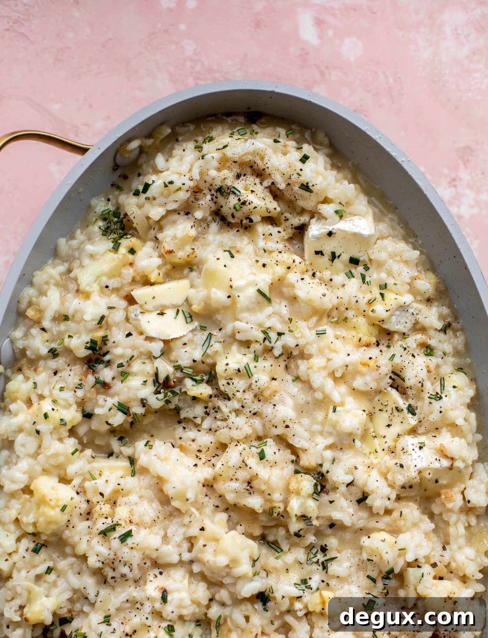 This baked risotto is delicious and so much easier than the stovetop version! Toasted cauliflower, brie cheese and rosemary make this taste incredible.