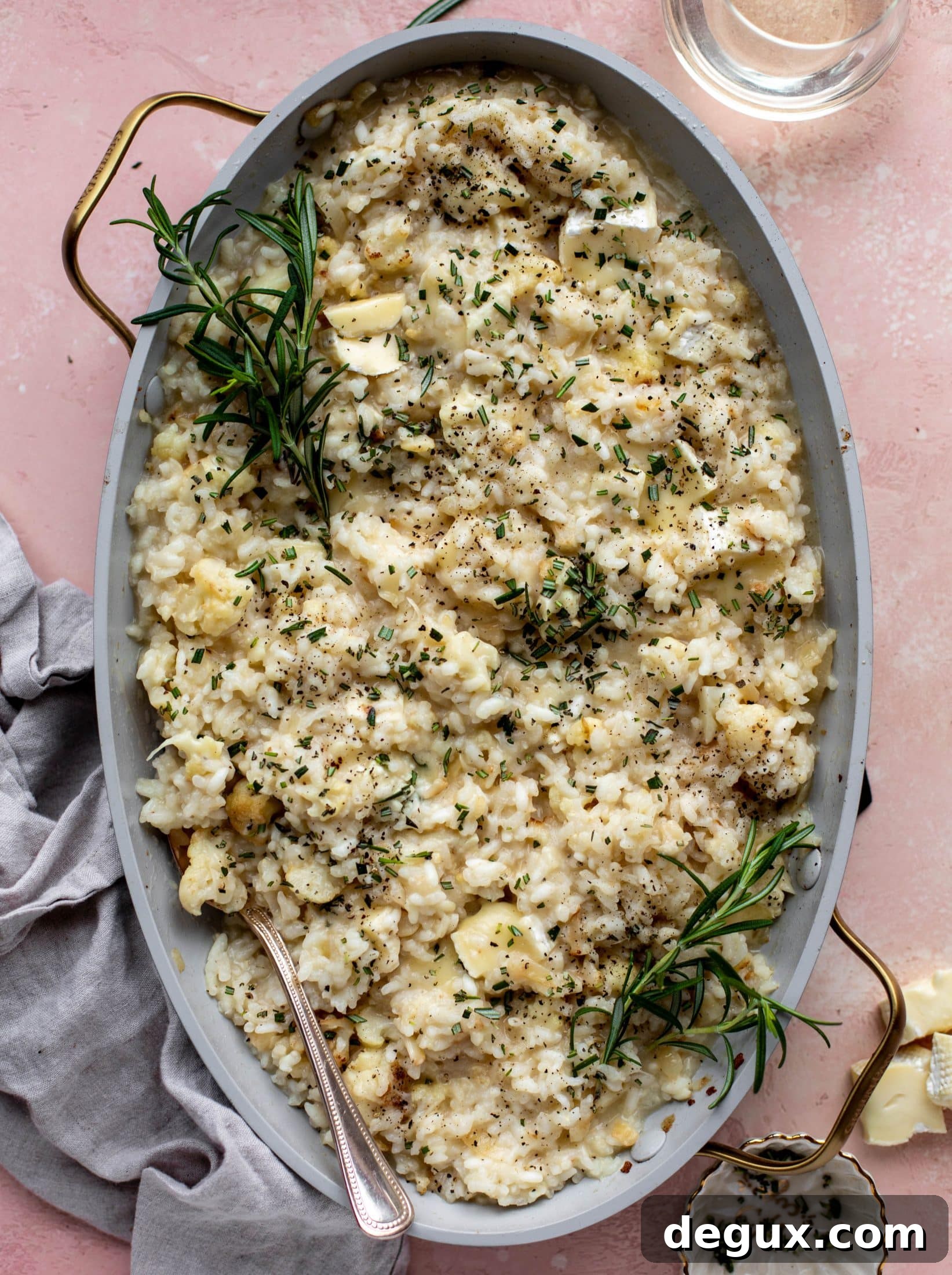 This baked risotto is delicious and so much easier than the stovetop version! Toasted cauliflower, brie cheese and rosemary make this taste incredible.
