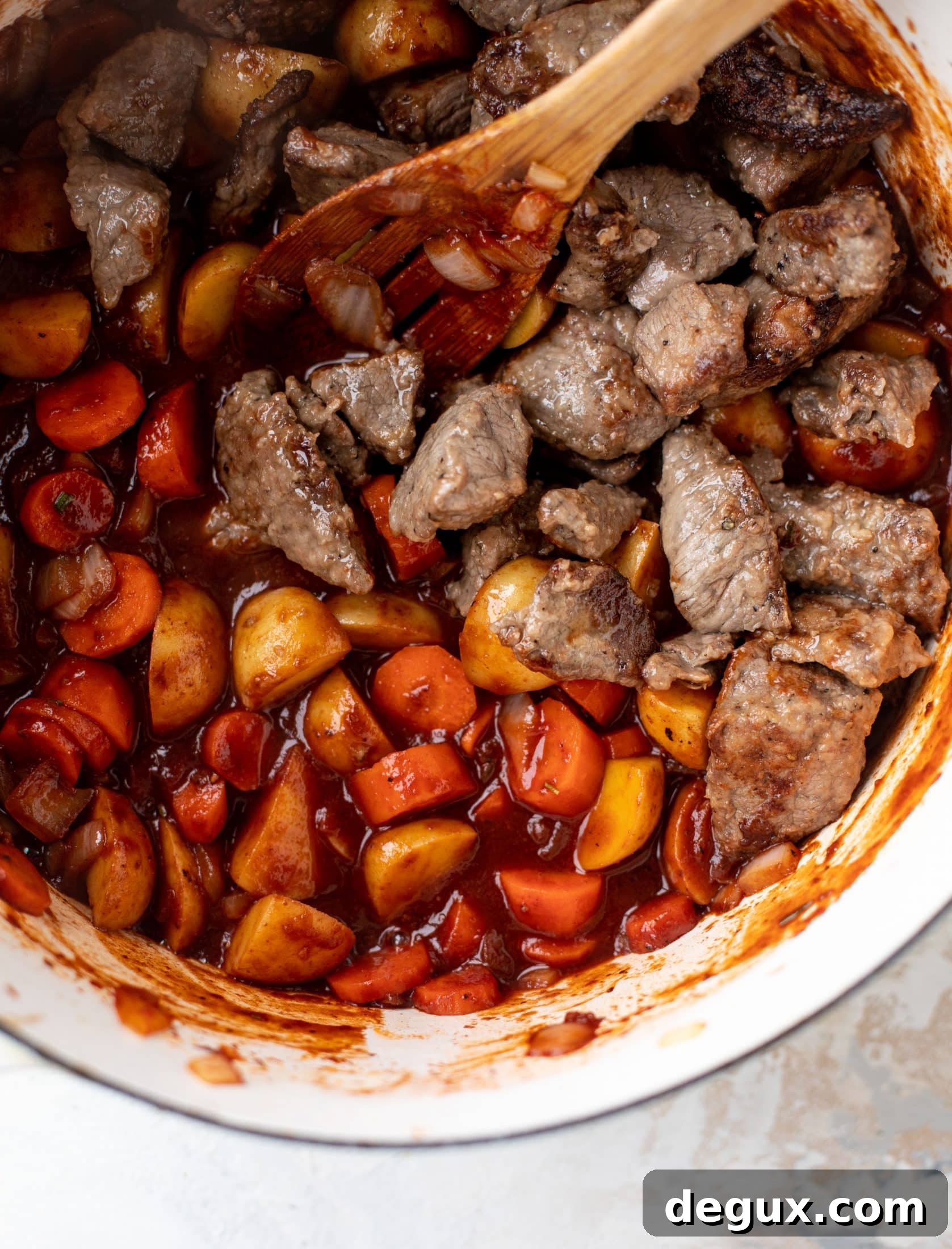 My new favorite soup! Irish stout beef stew is flavorful and hearty and topped with delicious herb dumplings. Perfect comfort food.