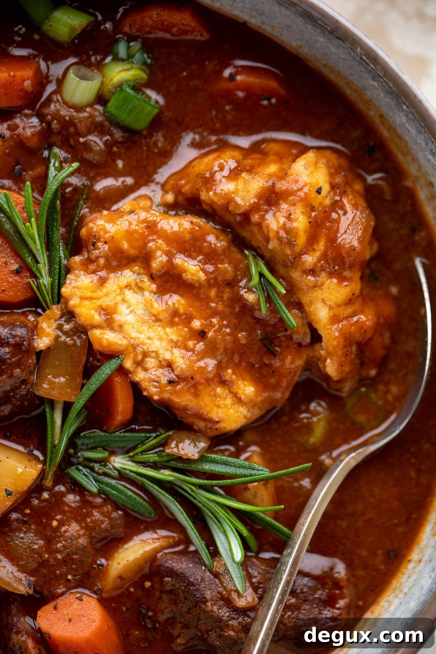 My new favorite soup! Irish stout beef stew is flavorful and hearty and topped with delicious herb dumplings. Perfect comfort food.