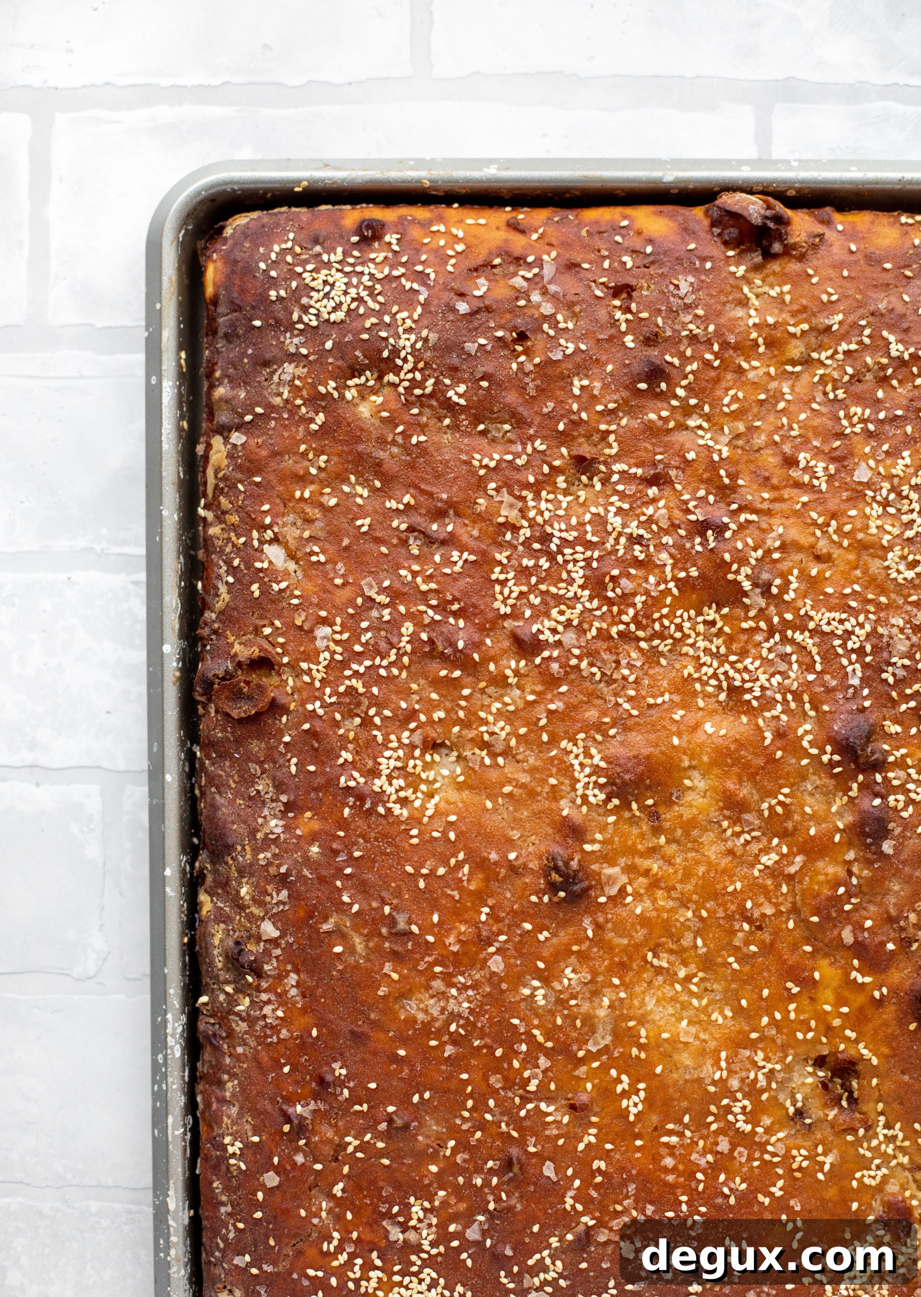 Sesame Pretzel Focaccia with Dijon Beer Cheese Dip 4 This sesame pretzel focaccia bread is amazing! Almost like a soft pretzel with crispy edges. Serve with a delicious dijon beer cheese.