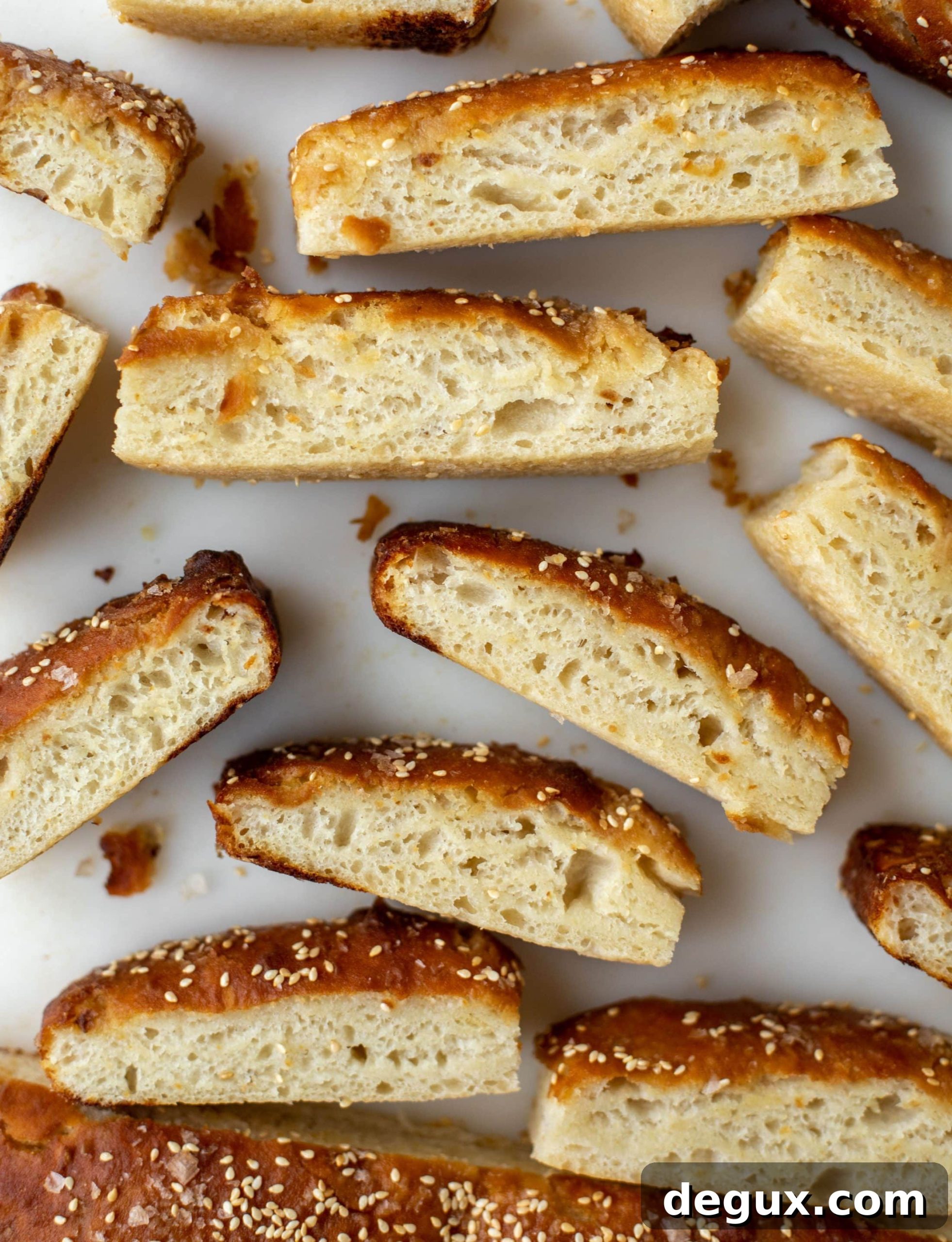 Sesame Pretzel Focaccia with Dijon Beer Cheese Dip 5 This sesame pretzel focaccia bread is amazing! Almost like a soft pretzel with crispy edges. Serve with a delicious dijon beer cheese.