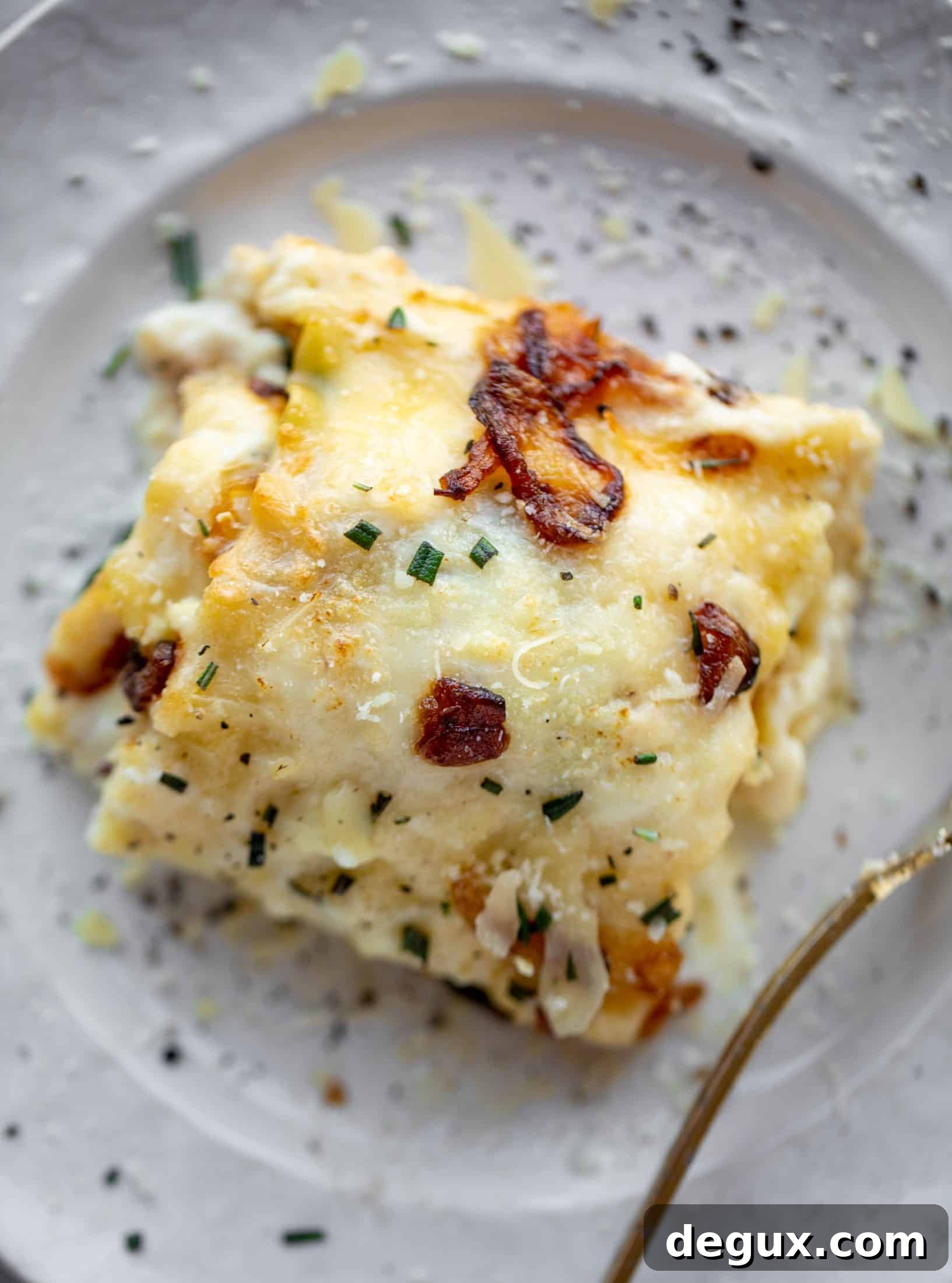 French Onion Chicken Lasagna Roll-Ups Recipe for Savory Weeknight Meals 12 These french onion chicken lasagna roll ups are loaded with flavor! Creamy sauce, chicken, spinach, caramelized onions and gruyere cheese. Love!