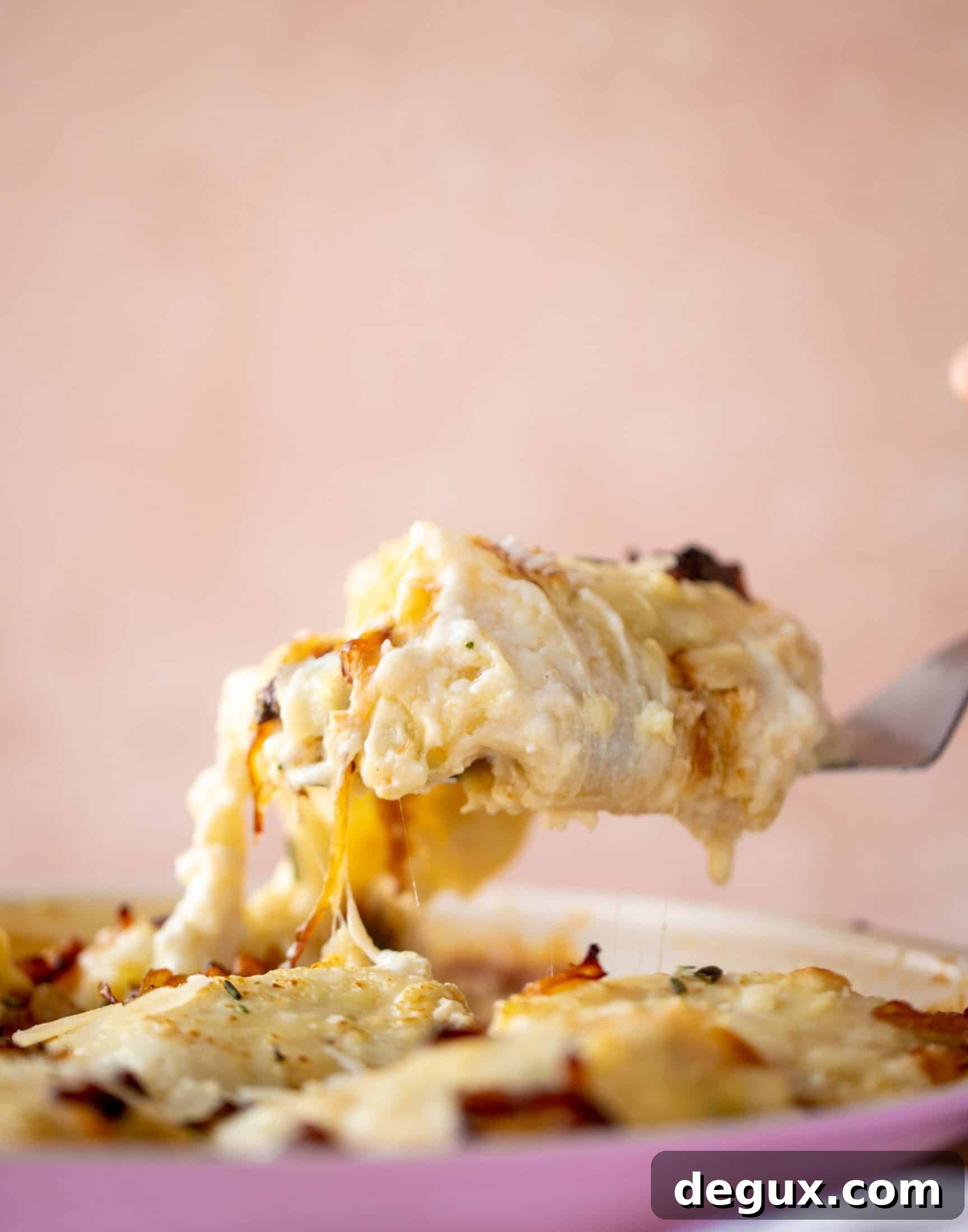 French Onion Chicken Lasagna Roll-Ups Recipe for Savory Weeknight Meals 7 These french onion chicken lasagna roll ups are loaded with flavor! Creamy sauce, chicken, spinach, caramelized onions and gruyere cheese. Love!