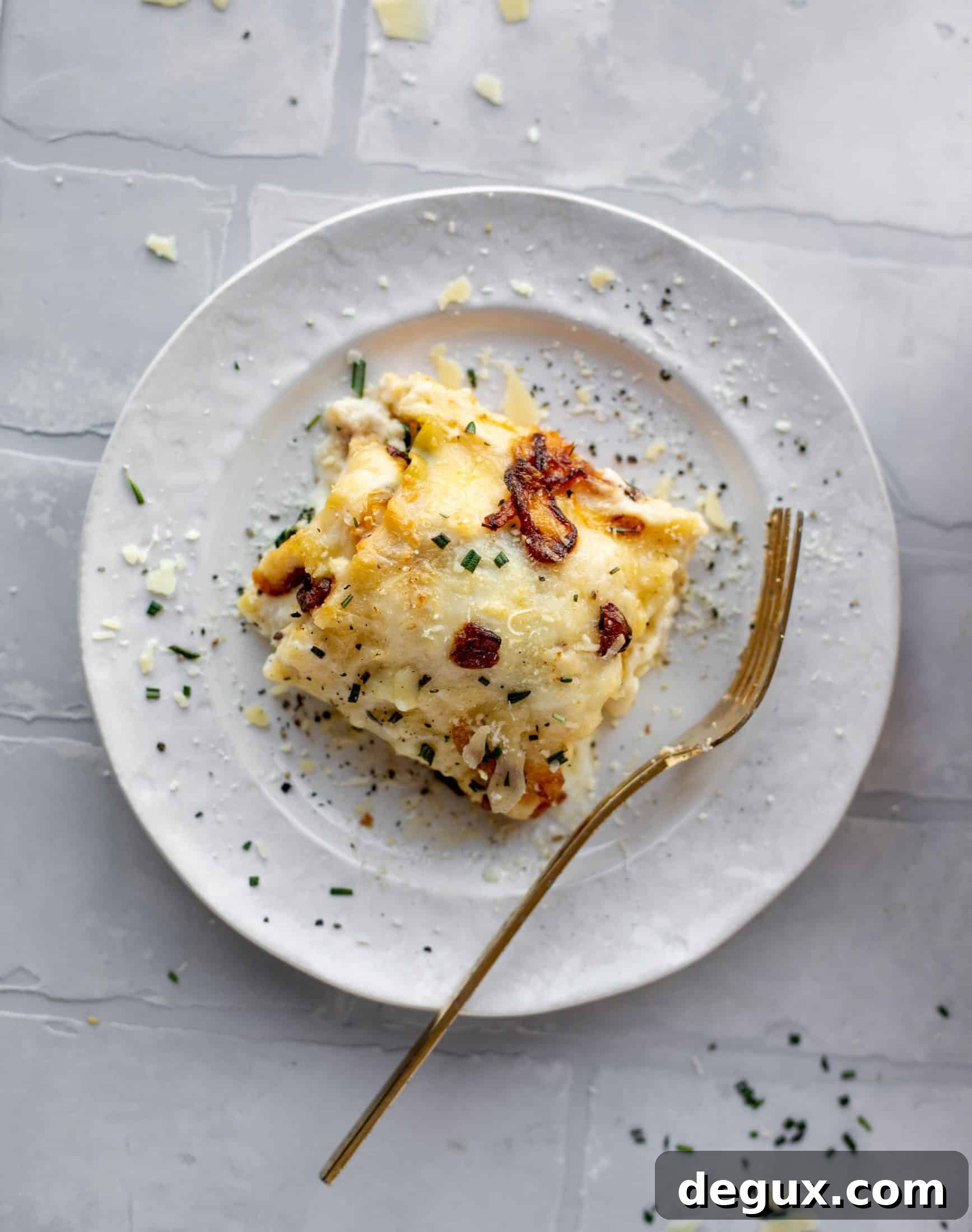 French Onion Chicken Lasagna Roll-Ups Recipe for Savory Weeknight Meals 10 These french onion chicken lasagna roll ups are loaded with flavor! Creamy sauce, chicken, spinach, caramelized onions and gruyere cheese. Love!