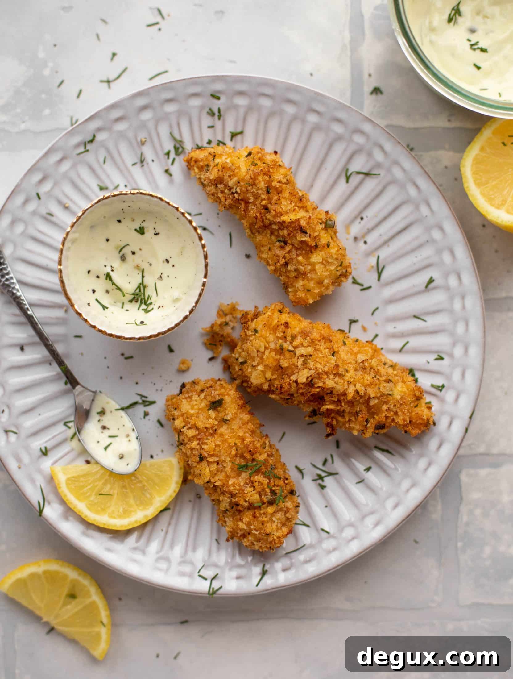 Crispy Lemon-Garlic Fish Sticks with Jalapeño Tartar Sauce 7 These crispy homemade fish sticks are flavored with lemon and garlic! They are super crunchy and delicious when dipped in the jalapeño tartar sauce.