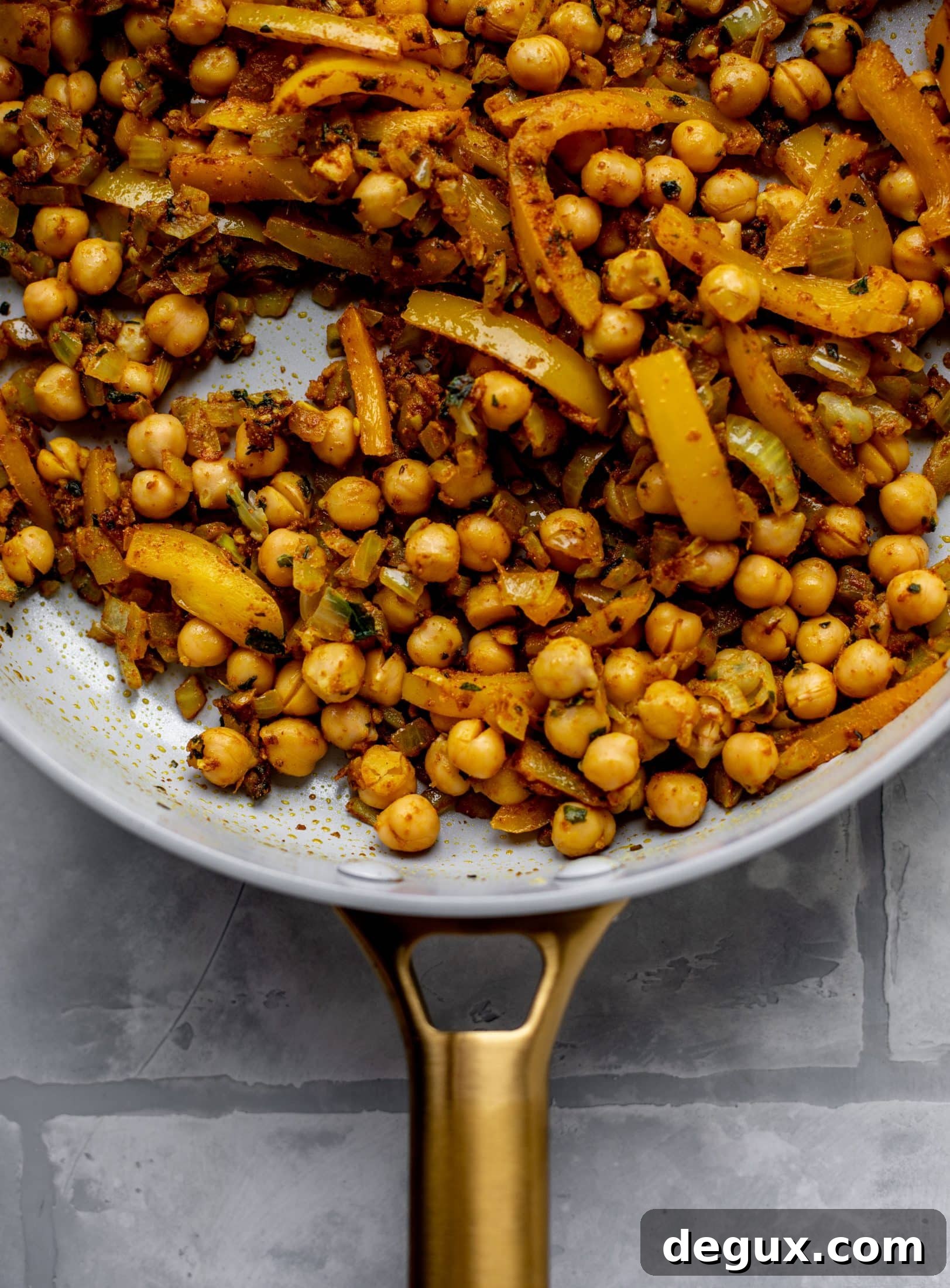 This basil chickpea coconut curry comes together in 20 minutes! Serve with jasmine rice or your favorite naan, or both! So easy and flavorful.