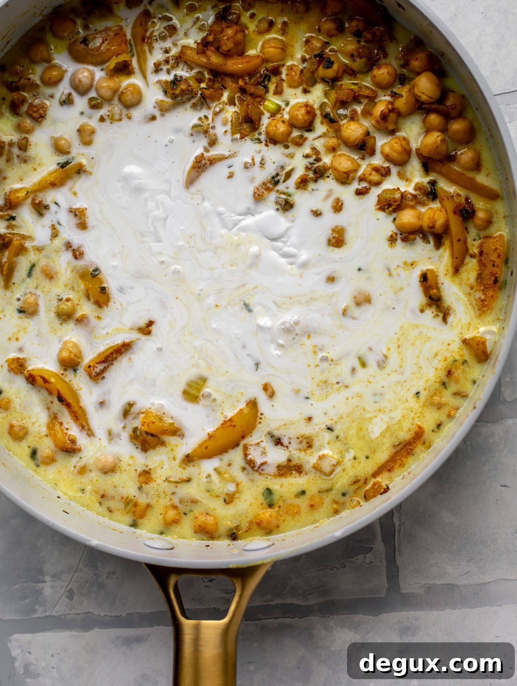 This basil chickpea coconut curry comes together in 20 minutes! Serve with jasmine rice or your favorite naan, or both! So easy and flavorful.