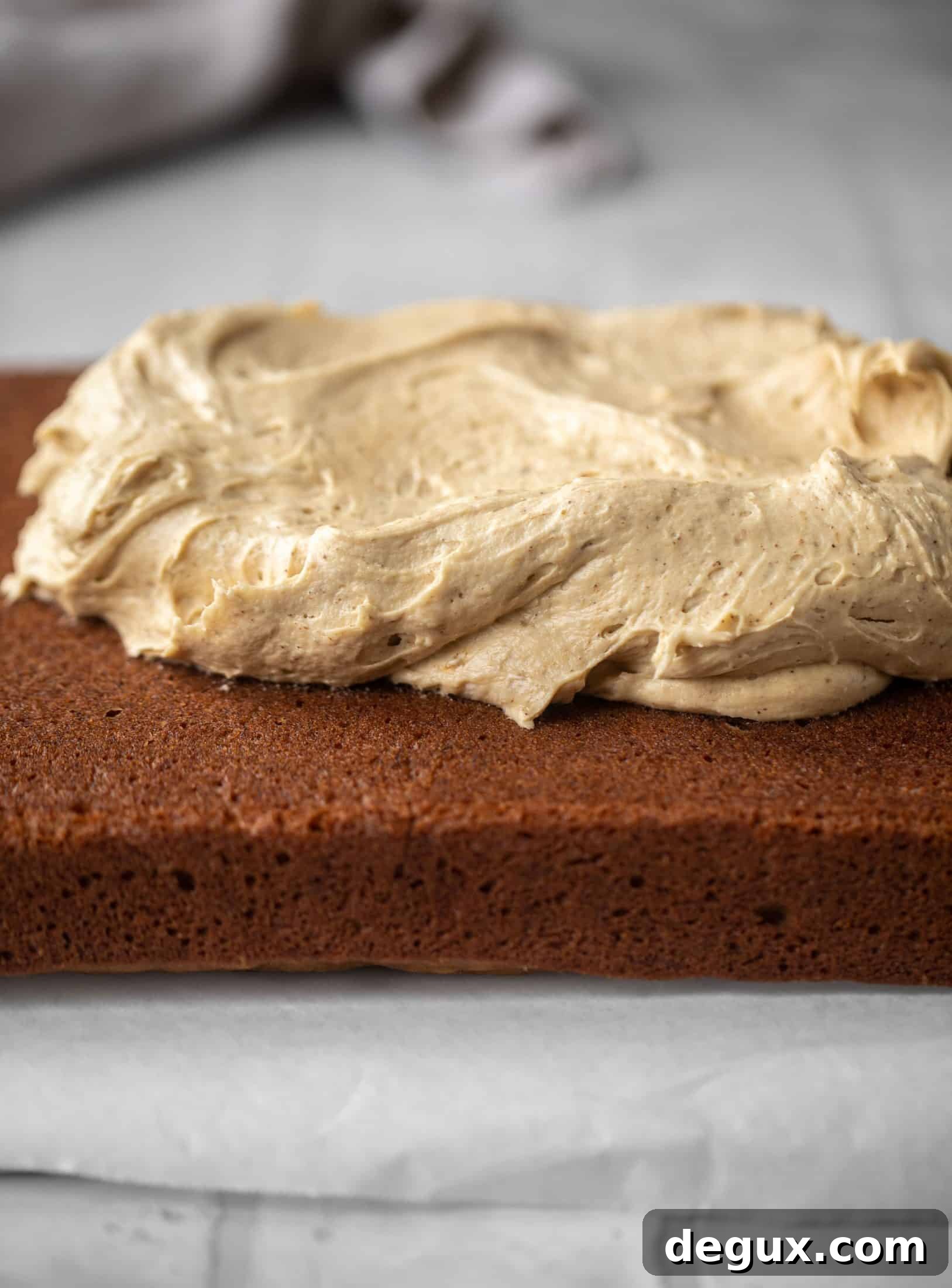 This banana cake is a delicious twist on banana bread! Covered with coffee cream cheese frosting, it’s an easy and wonderful treat.