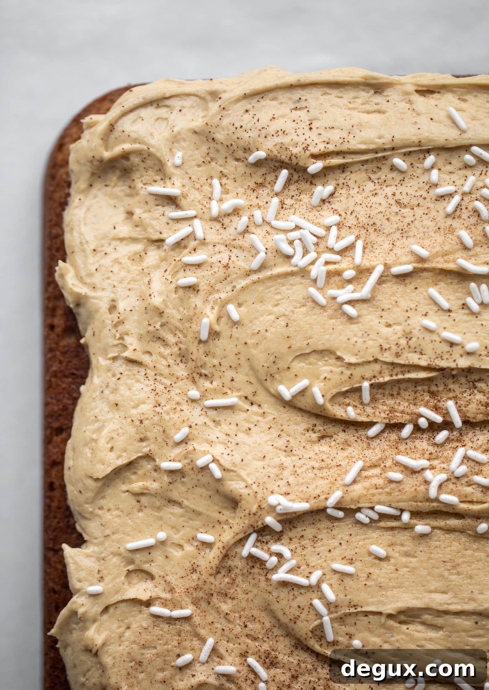 This banana cake is a delicious twist on banana bread! Covered with coffee cream cheese frosting, it’s an easy and wonderful treat.