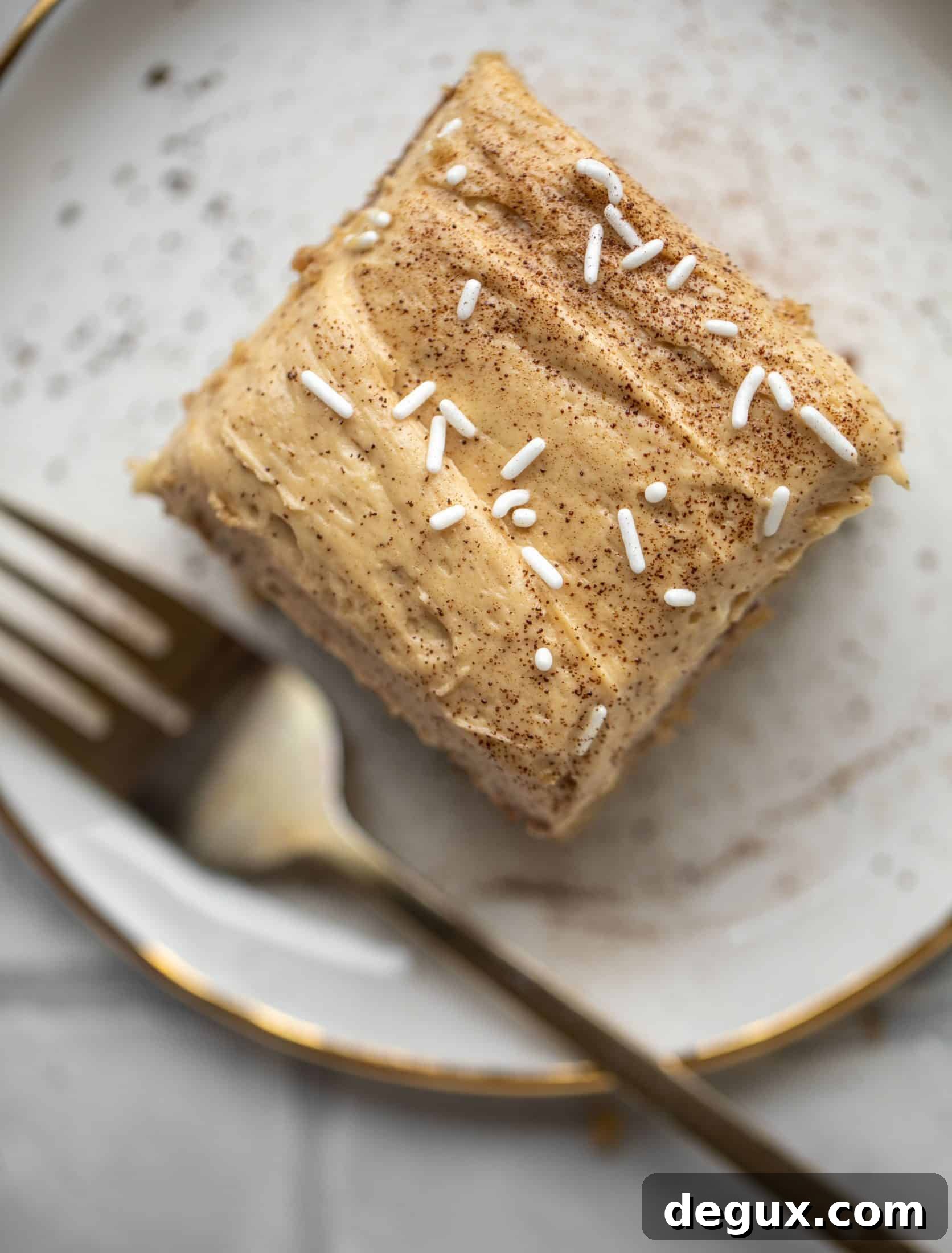 This banana cake is a delicious twist on banana bread! Covered with coffee cream cheese frosting, it’s an easy and wonderful treat.