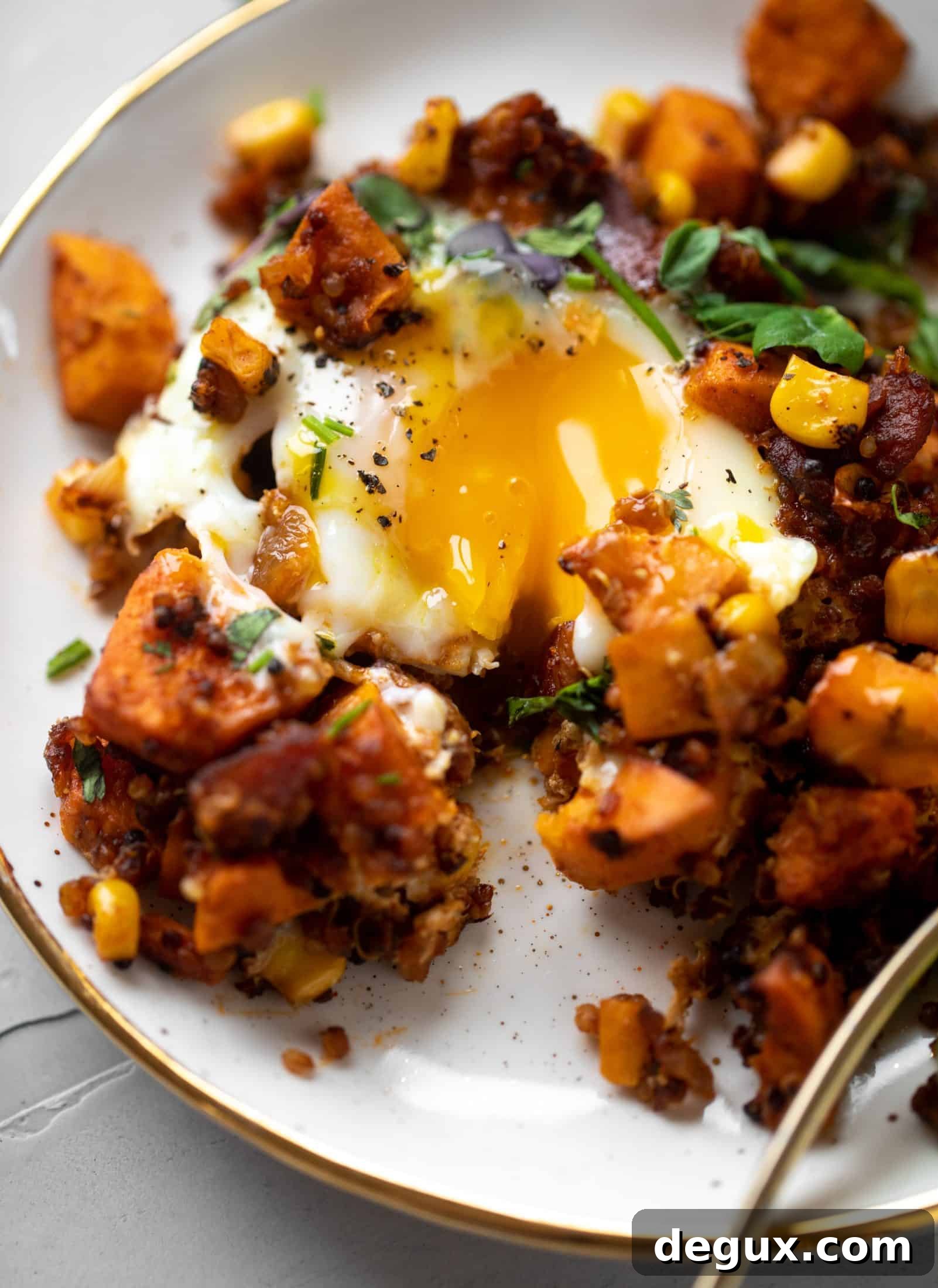 This chipotle sweet potato hash is perfect for breakfast, lunch or dinner. Bulked up with quinoa and tons of flavor, it's a great pantry weeknight meal!