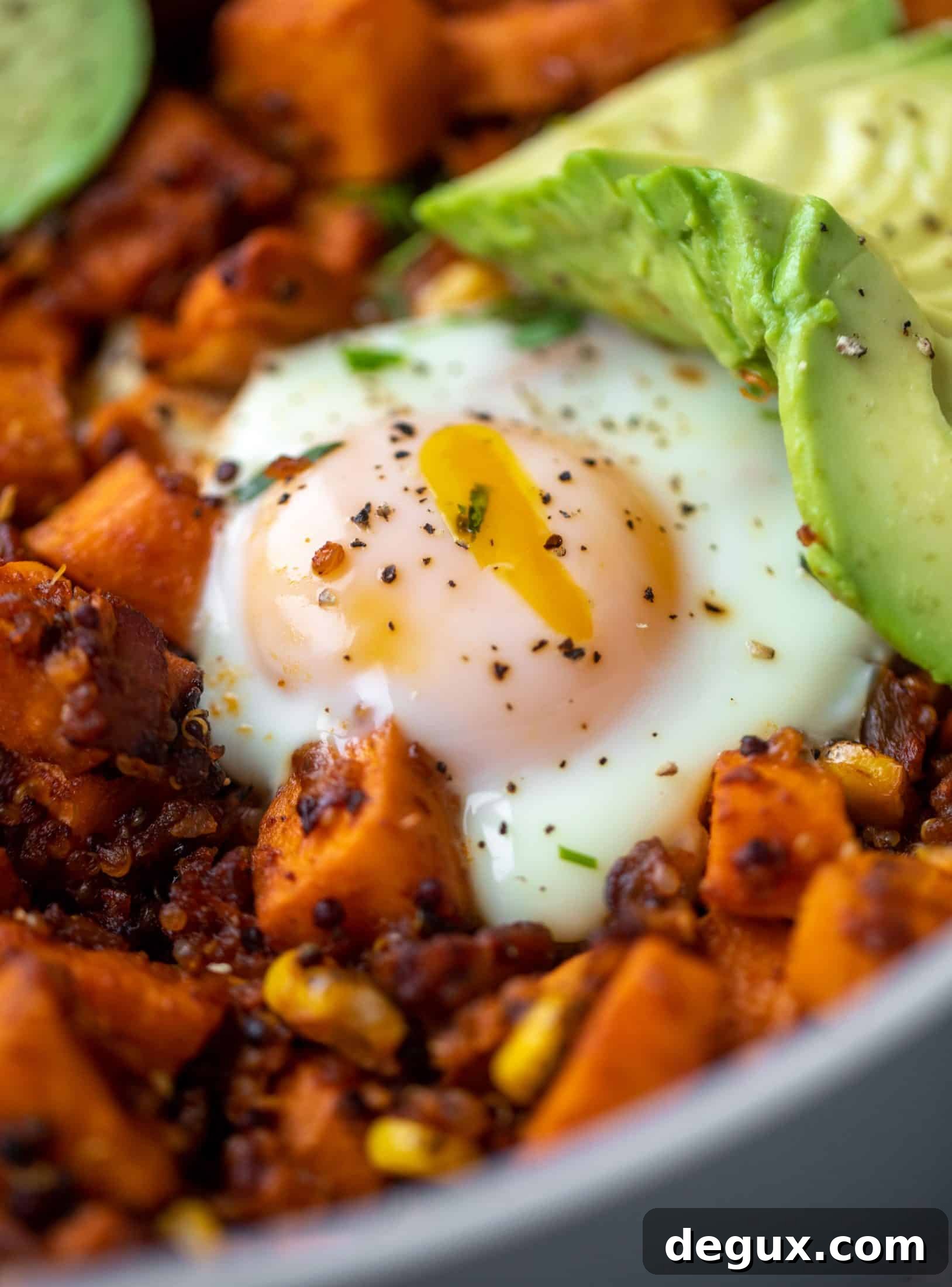 This chipotle sweet potato hash is perfect for breakfast, lunch or dinner. Bulked up with quinoa and tons of flavor, it's a great pantry weeknight meal!