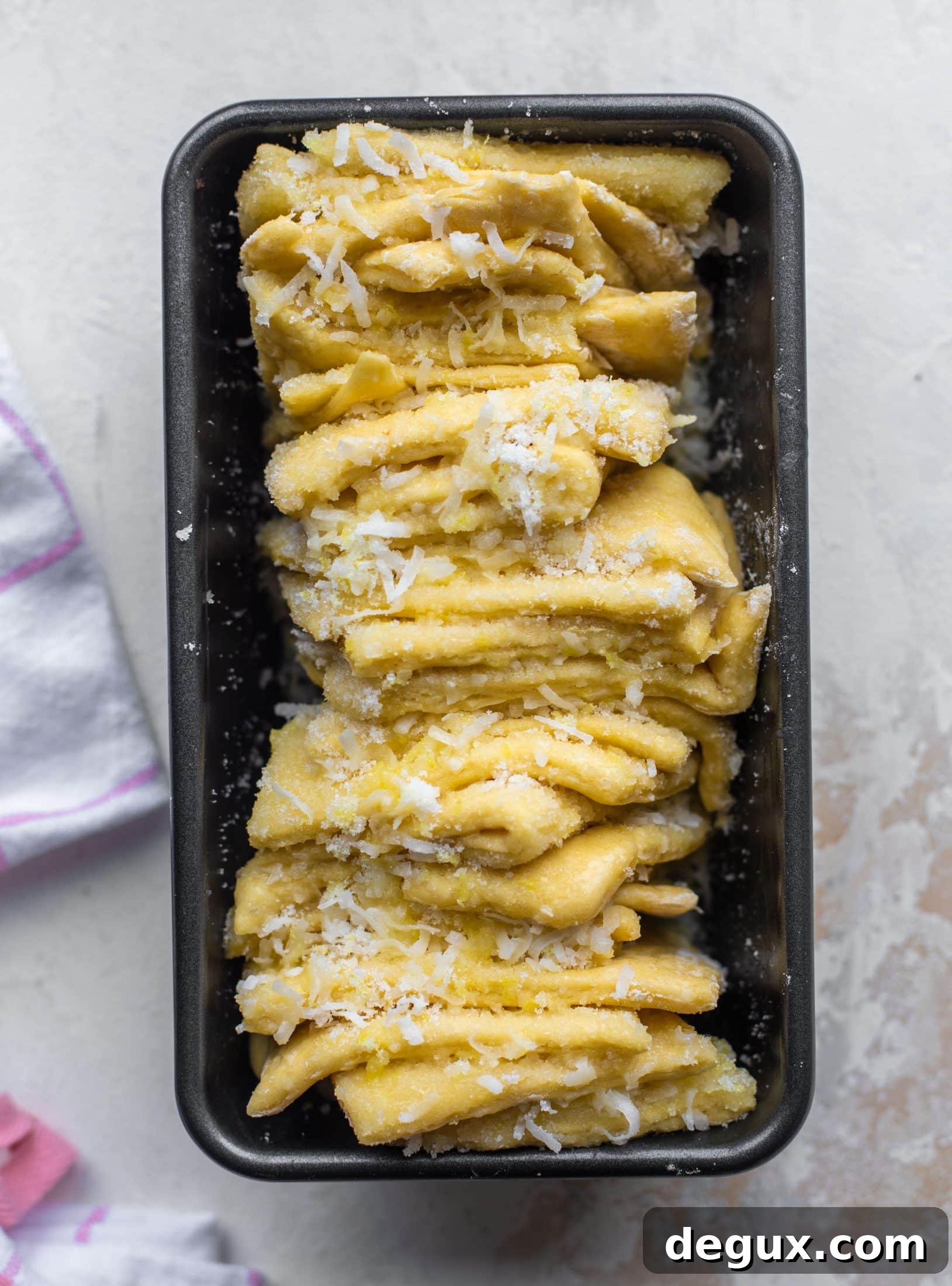 Lemon Coconut Pull-Apart Bread Recipe for Brunch 5 This lemon coconut bread is a pull apart dream! It's perfect for brunch or dessert with the perfect amount of fluffiness.