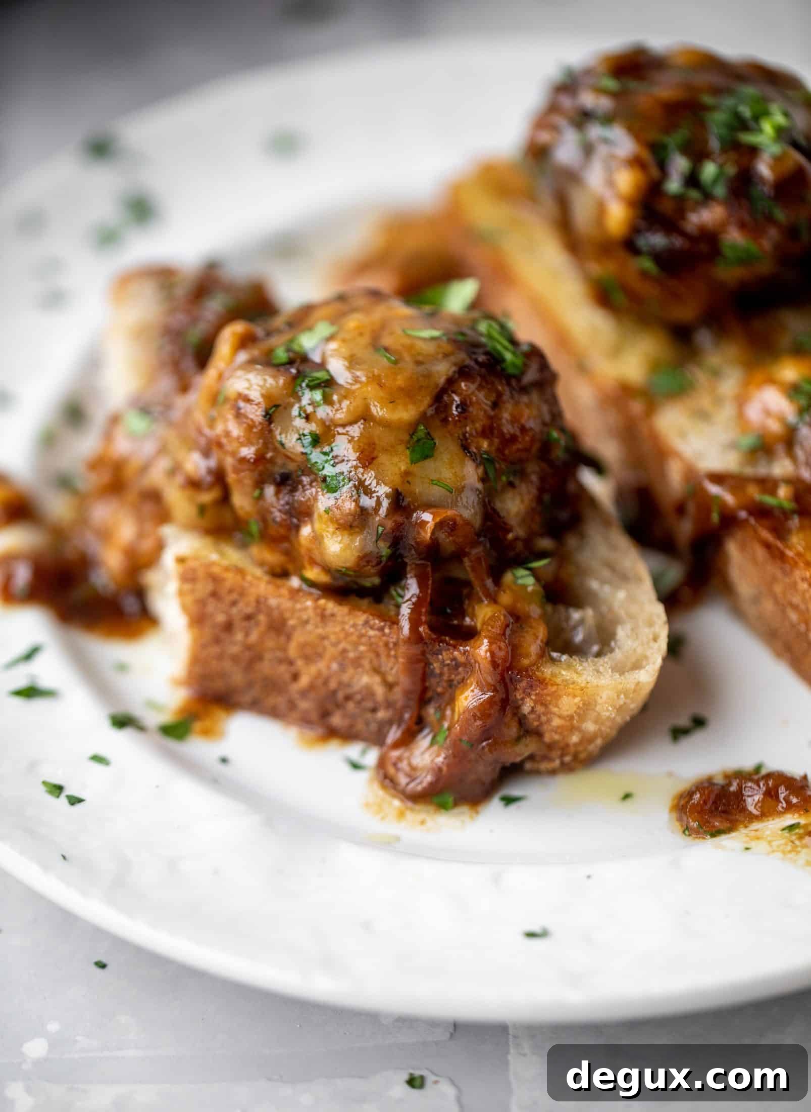 Weekend French Onion Meatballs: Savory Comfort Recipe 11 These french onion meatballs are super delicious! All the flavors of french onion soup made into juicy meatballs. Cheesy, saucy goodness!