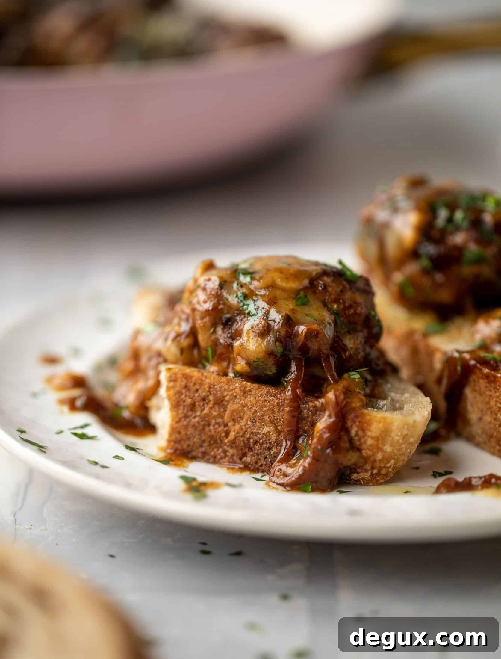 Weekend French Onion Meatballs: Savory Comfort Recipe 13 These french onion meatballs are super delicious! All the flavors of french onion soup made into juicy meatballs. Cheesy, saucy goodness!