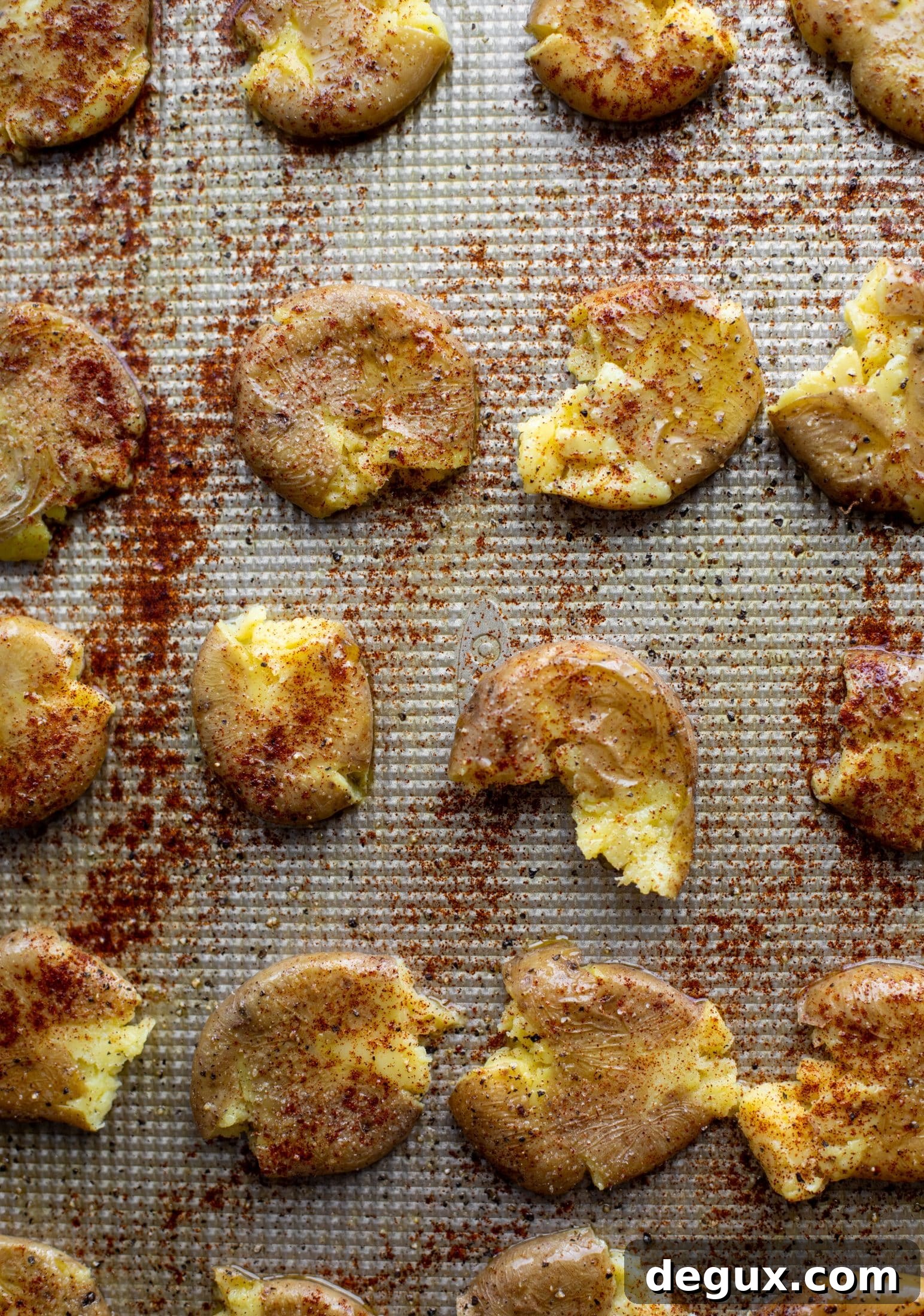 smashed chipotle potatoes on a baking sheet
