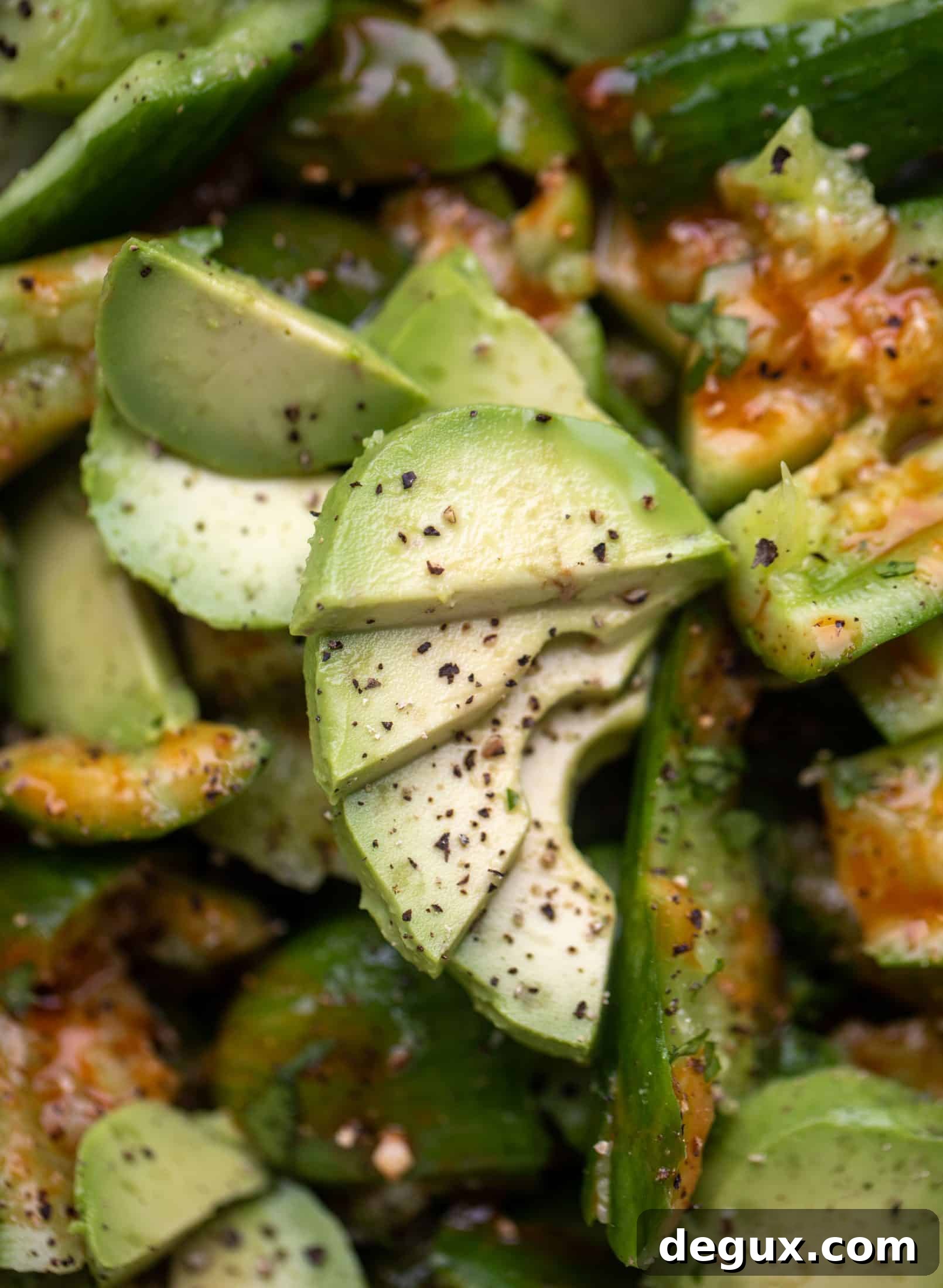 This smashed buffalo cucumber salad is filled with tons of buffalo wing flavor! Avocado, blue cheese, peanuts and lime juice make this irresistible. 