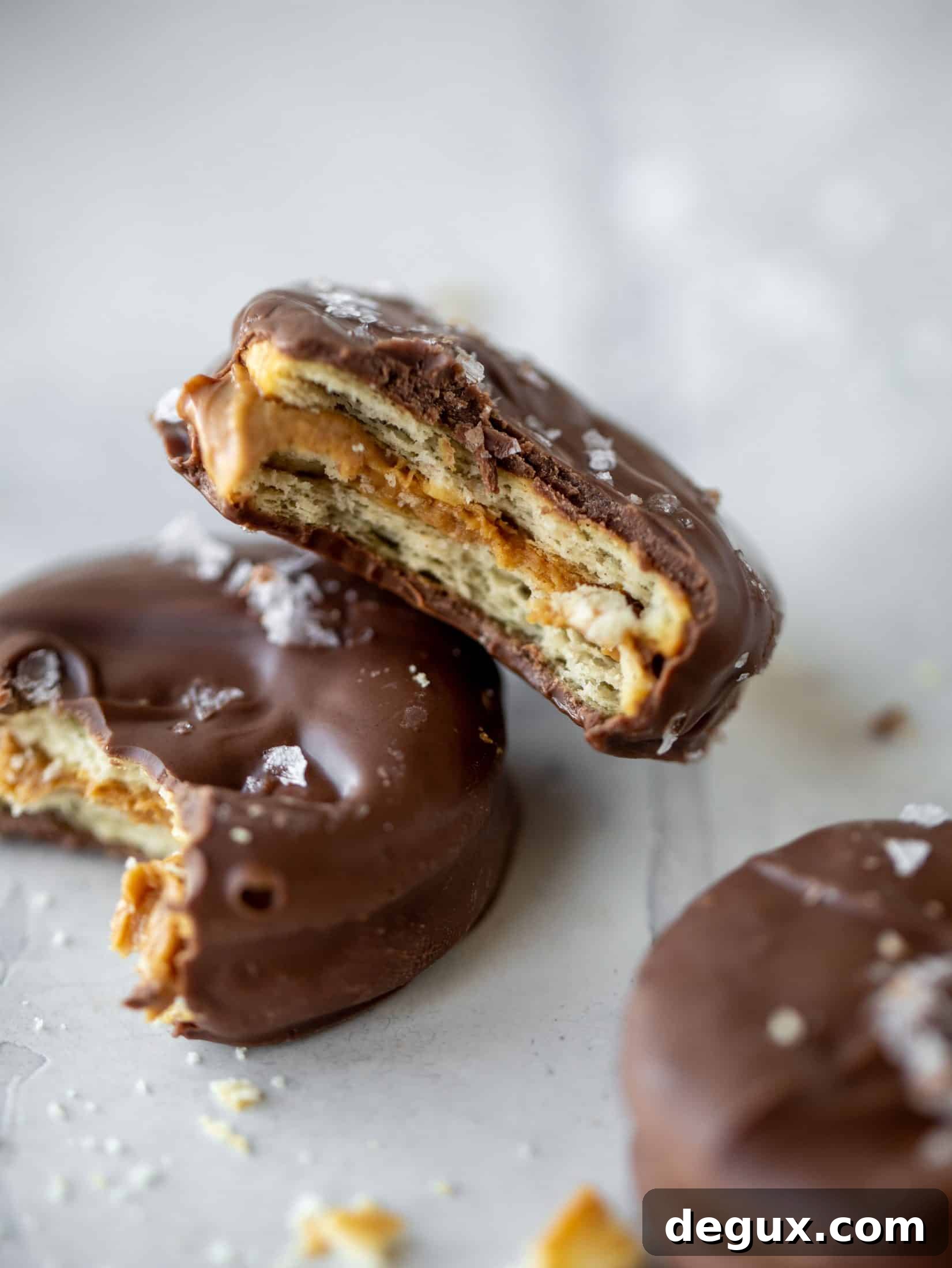 Ritz Cracker Peanut Butter Cups Recipe — Sweet & Salty Bites 12 These ritz peanut butter cups are everything! Creamy peanut butter, flakey, buttery crackers, melted chocolate and flaked salt. They are unreal.