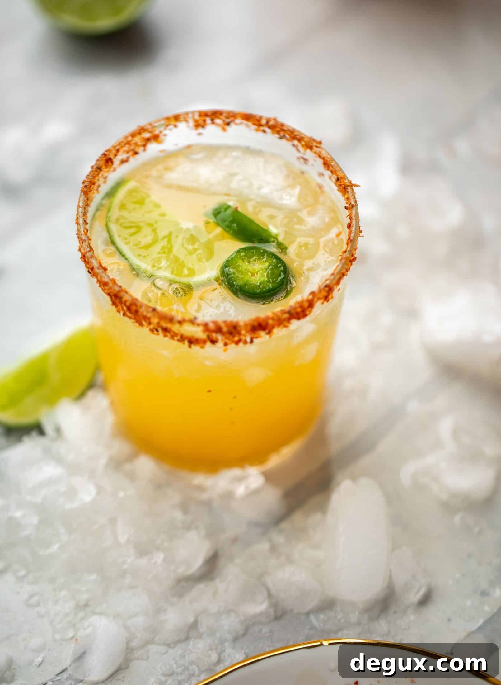 These bubbly jam margaritas are easy and delicious! Use your favorite jam instead of simple syrup to create a fruity flavor everyone will love.