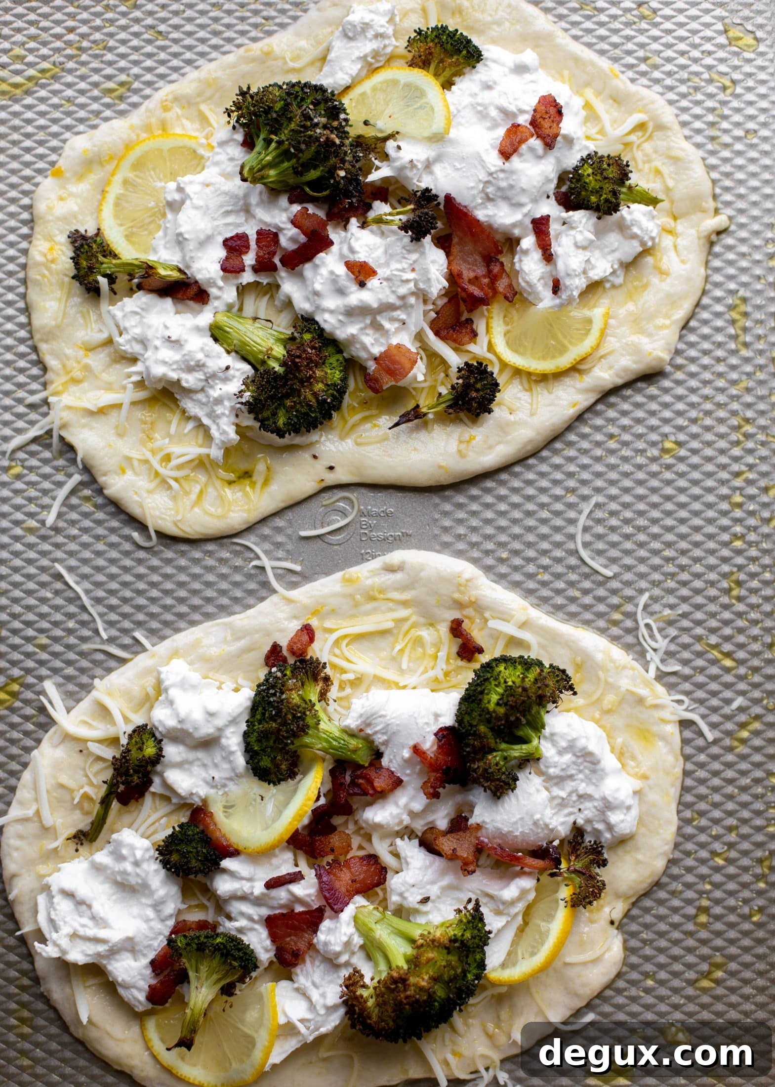 Cheesy Lemon Flatbread Pizza Drizzled with Spicy Honey 5 This cheesy lemon flatbread pizza is covered with burrata cheese, parmesan, roasted vegetables and hot honey. It's a flavor dream!