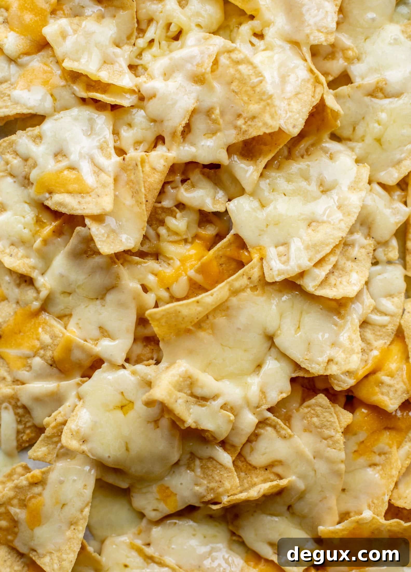 Sheet Pan Street Corn Nachos Recipe for Crowd-Friendly Snack 3 cheesy melted tortilla chips