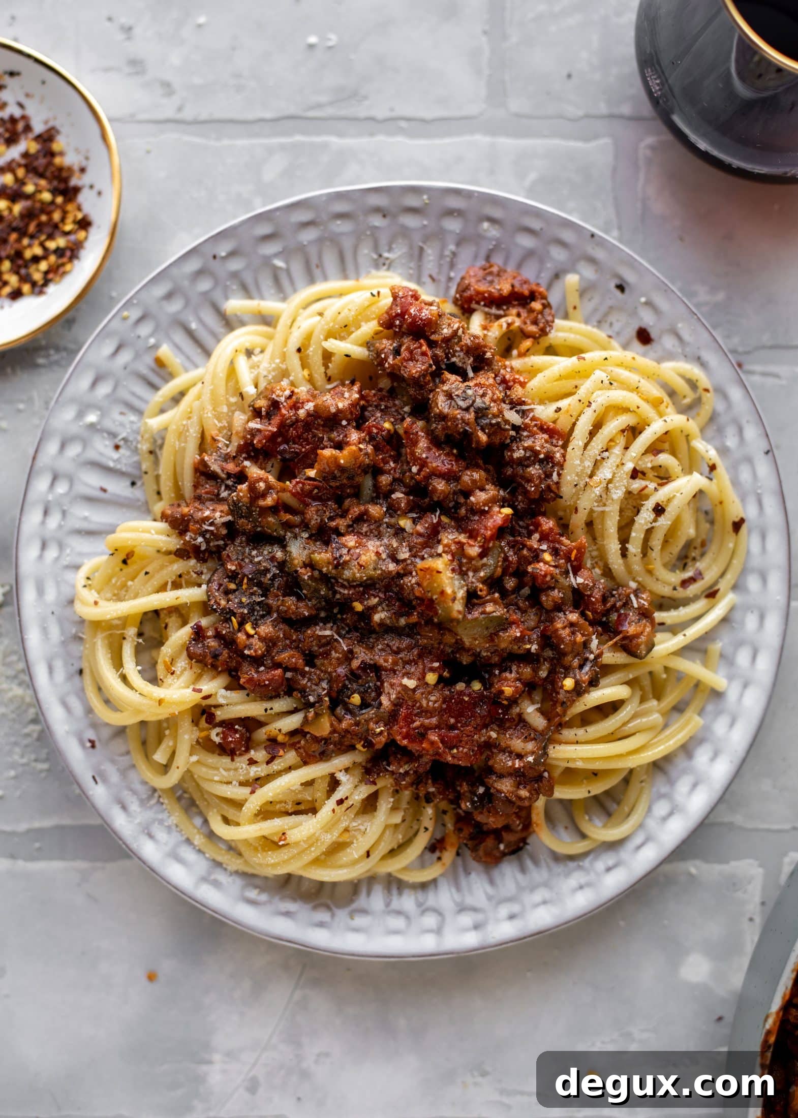 This lentil bolognese is incredible! Super hearty, loaded with vegetables, saucy, rich and decadent. You won't even miss the meat!