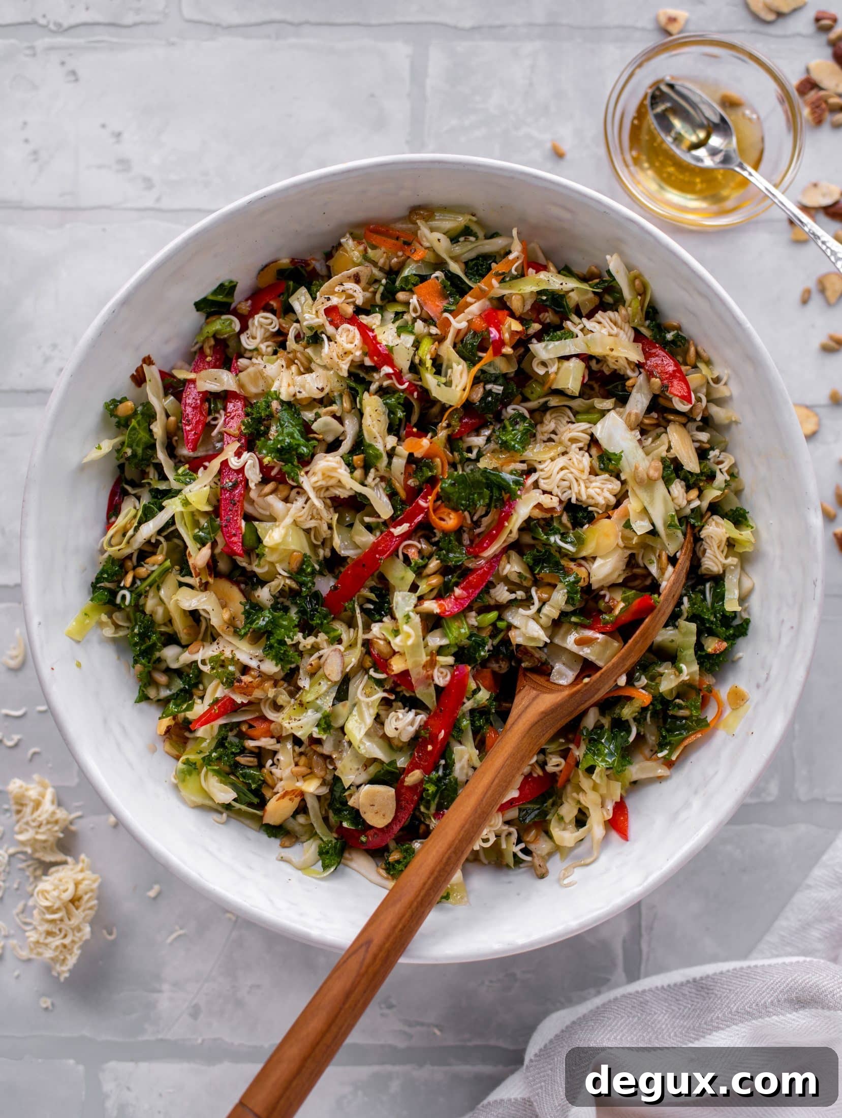 Crunchy Ramen Noodle Salad with Sesame-Ginger Dressing 8 This ramen noodle crunch salad is the perfect make ahead party salad! It's full of sesame flavor and super crunchy. It's a huge hit!