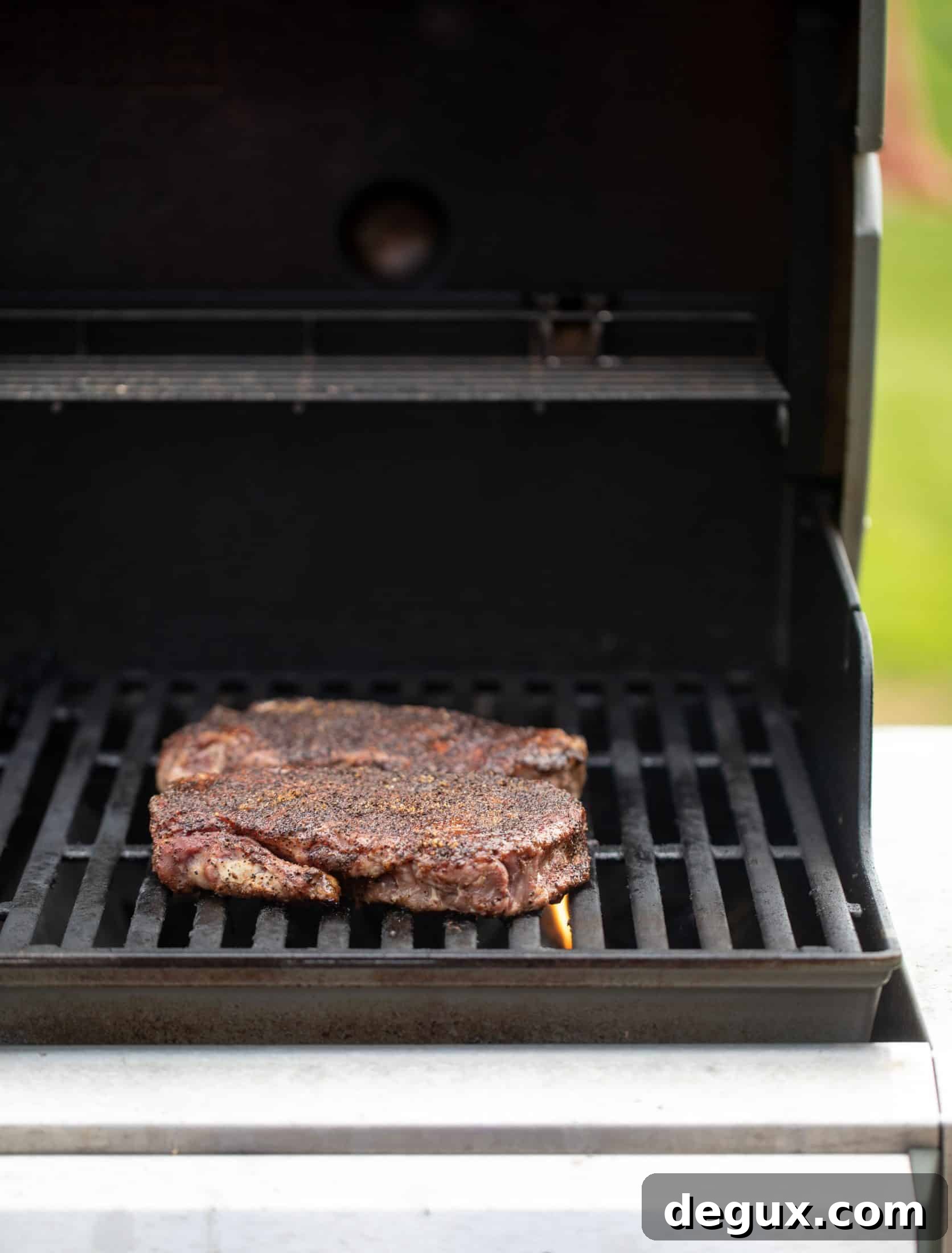 Coffee-Rubbed Strip Steak with Herbed Corn Salsa 6 coffee crusted steak on the grill