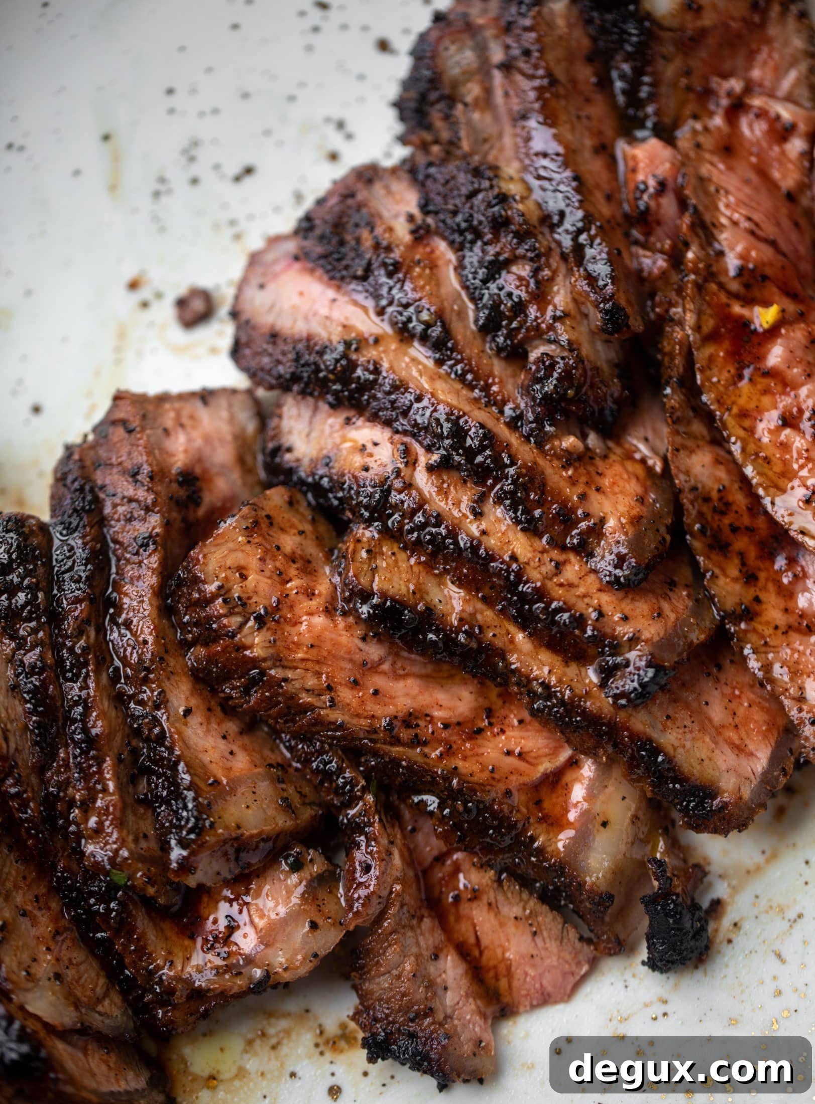 Coffee-Rubbed Strip Steak with Herbed Corn Salsa 7 sliced coffee crusted steak