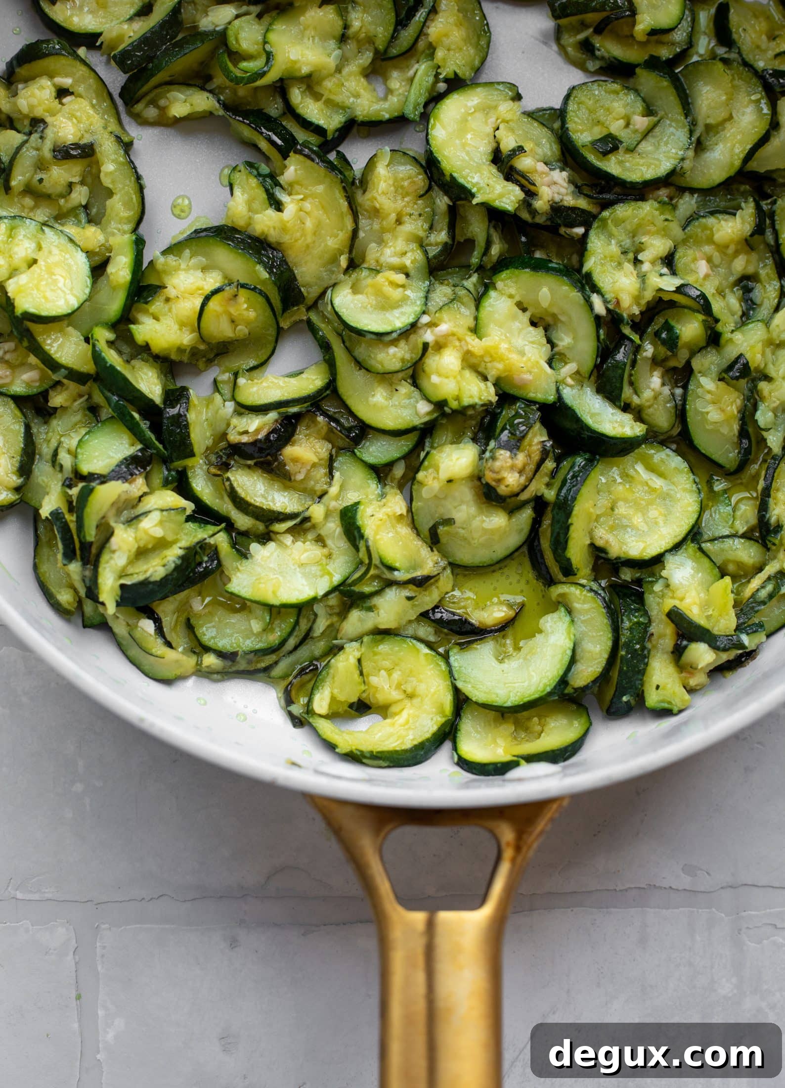 melted zucchini and garlic in skillet