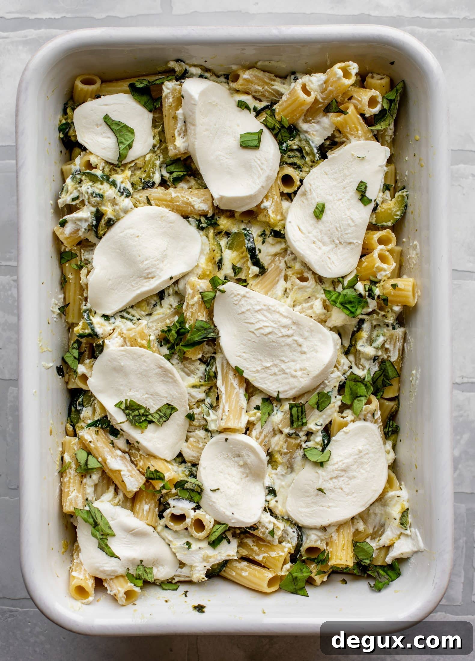 fresh mozzarella covering zucchini ziti