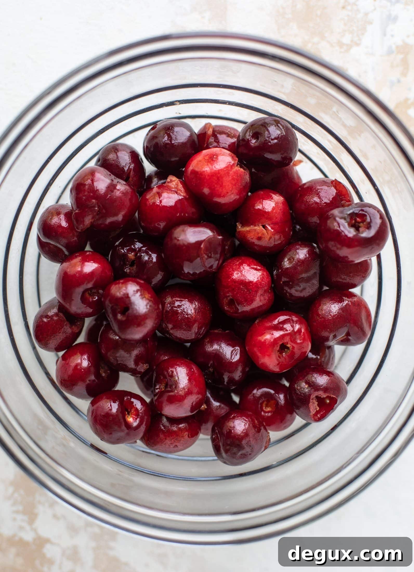 Cherry Lime Gin & Tonic Cocktail Recipe: Refreshing Summer Drink 3 pitted bing cherries
