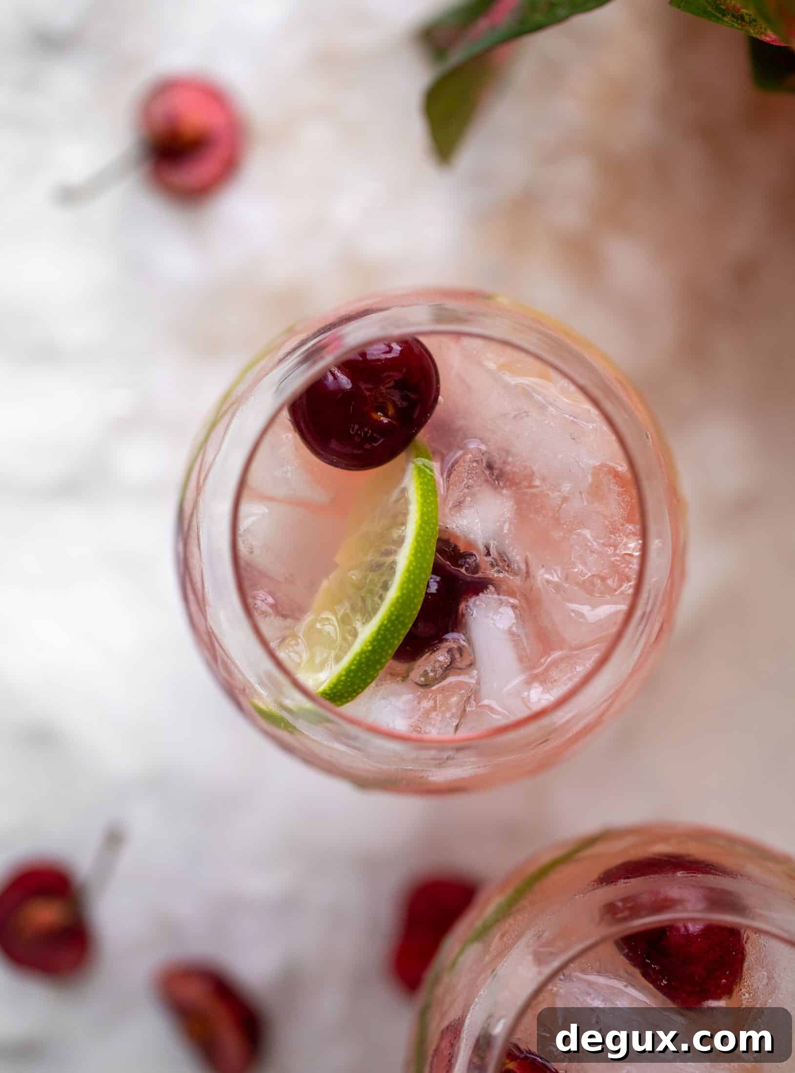 Cherry Lime Gin & Tonic Cocktail Recipe: Refreshing Summer Drink 5 close up cherry lime gin and tonic