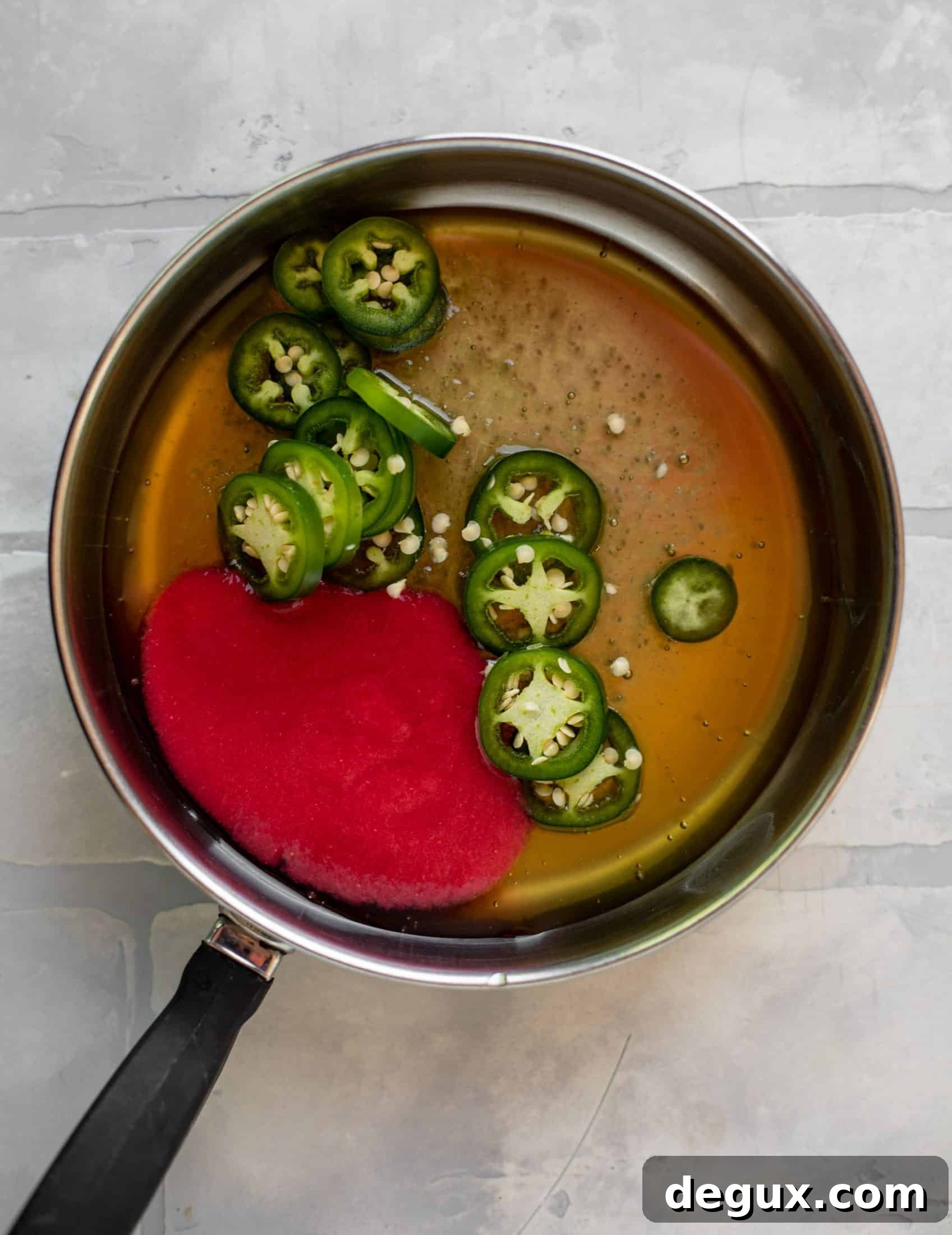 Crispy Baked Popcorn Chicken with Raspberry Hot Honey Drizzle 3 raspberry puree and jalapeno in honey