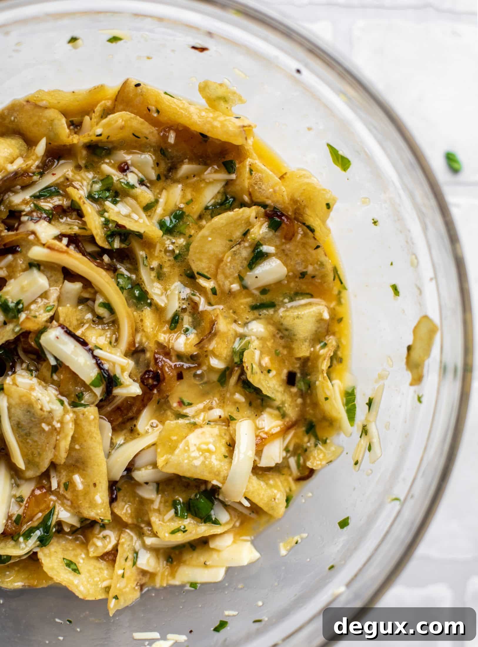 Crispy Potato Chip Frittata with Caramelized Onions 5 frittata mixture in a bowl
