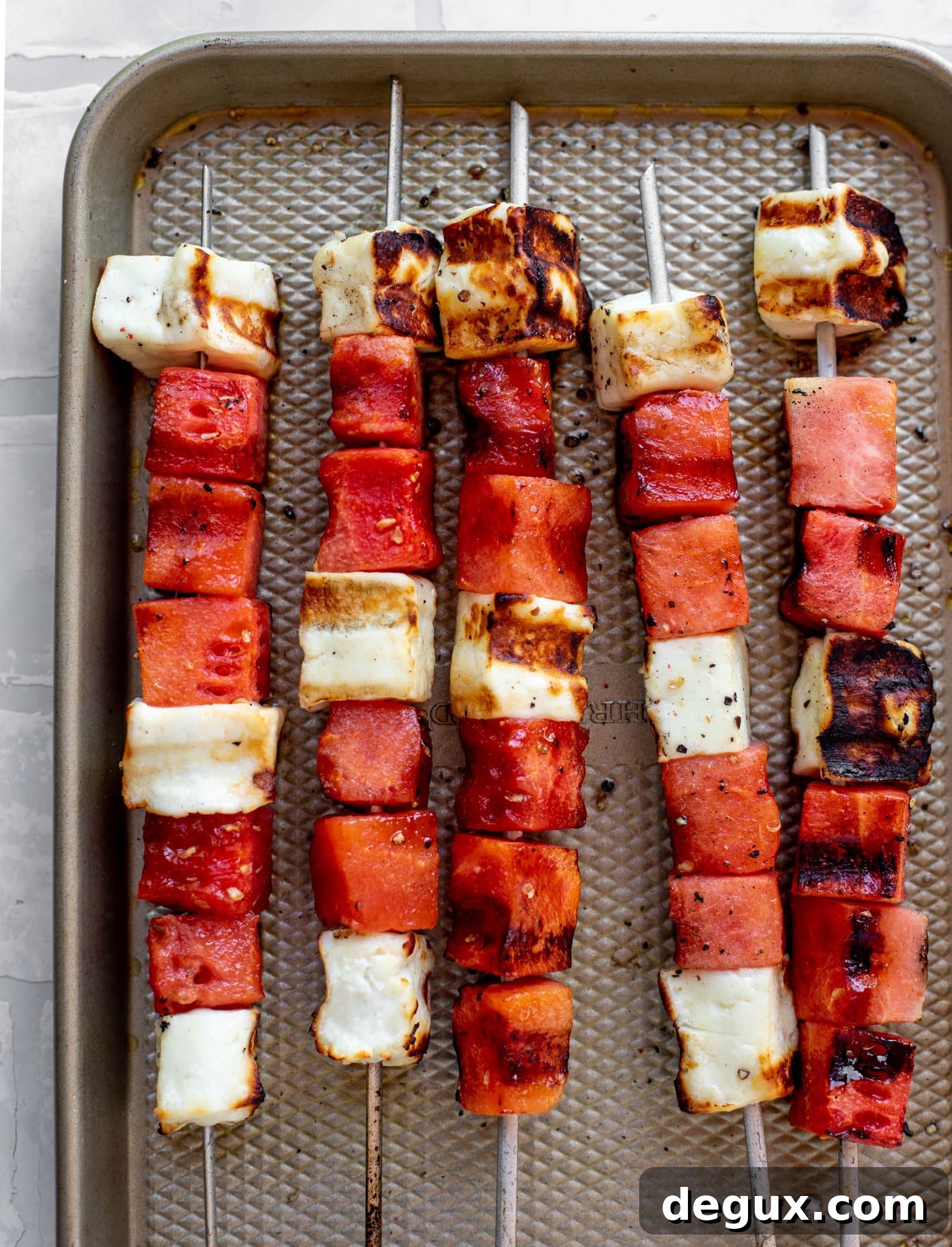grilled watermelon halloumi skewers right off the grill