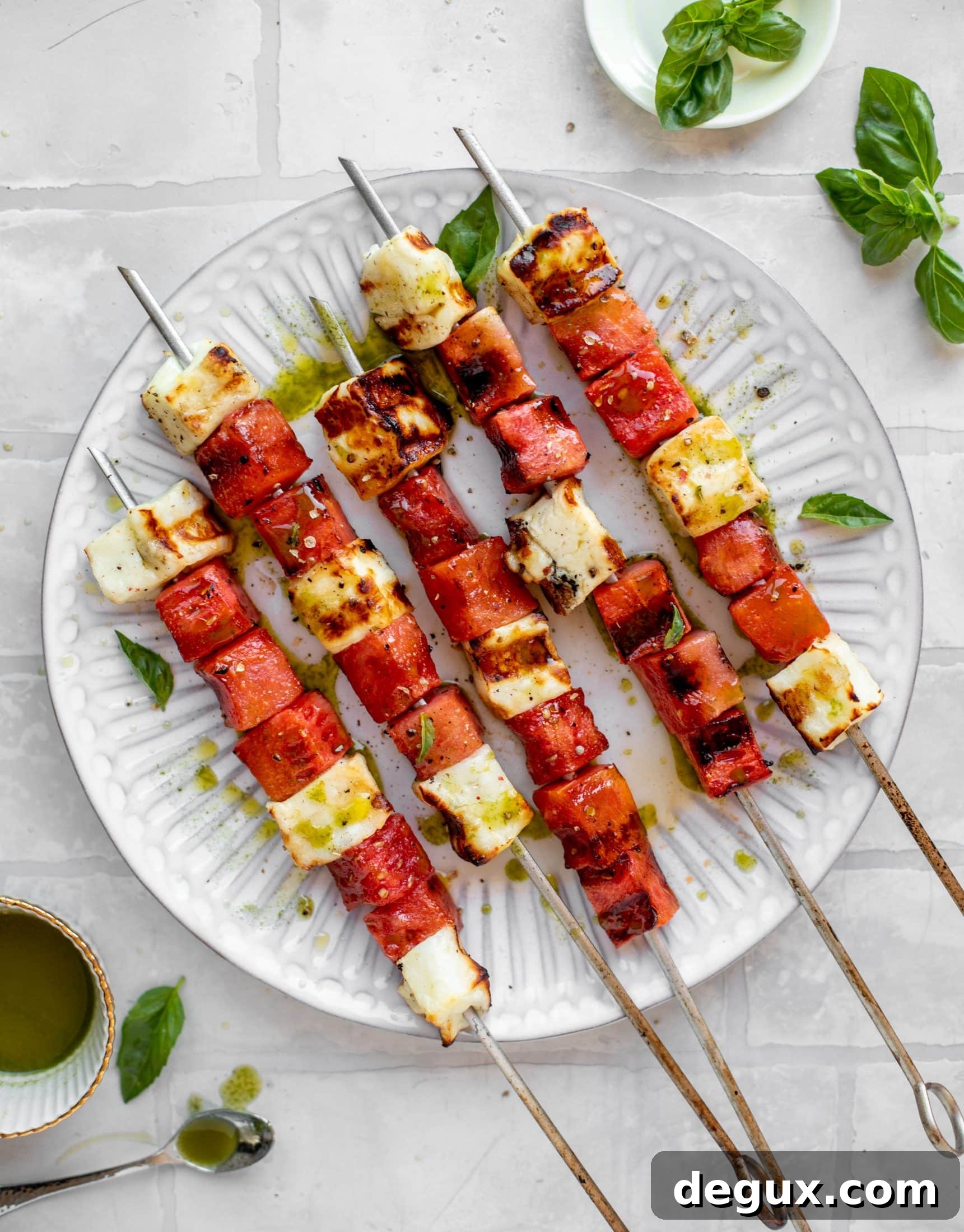 grilled watermelon halloumi skewers with mint basil oil