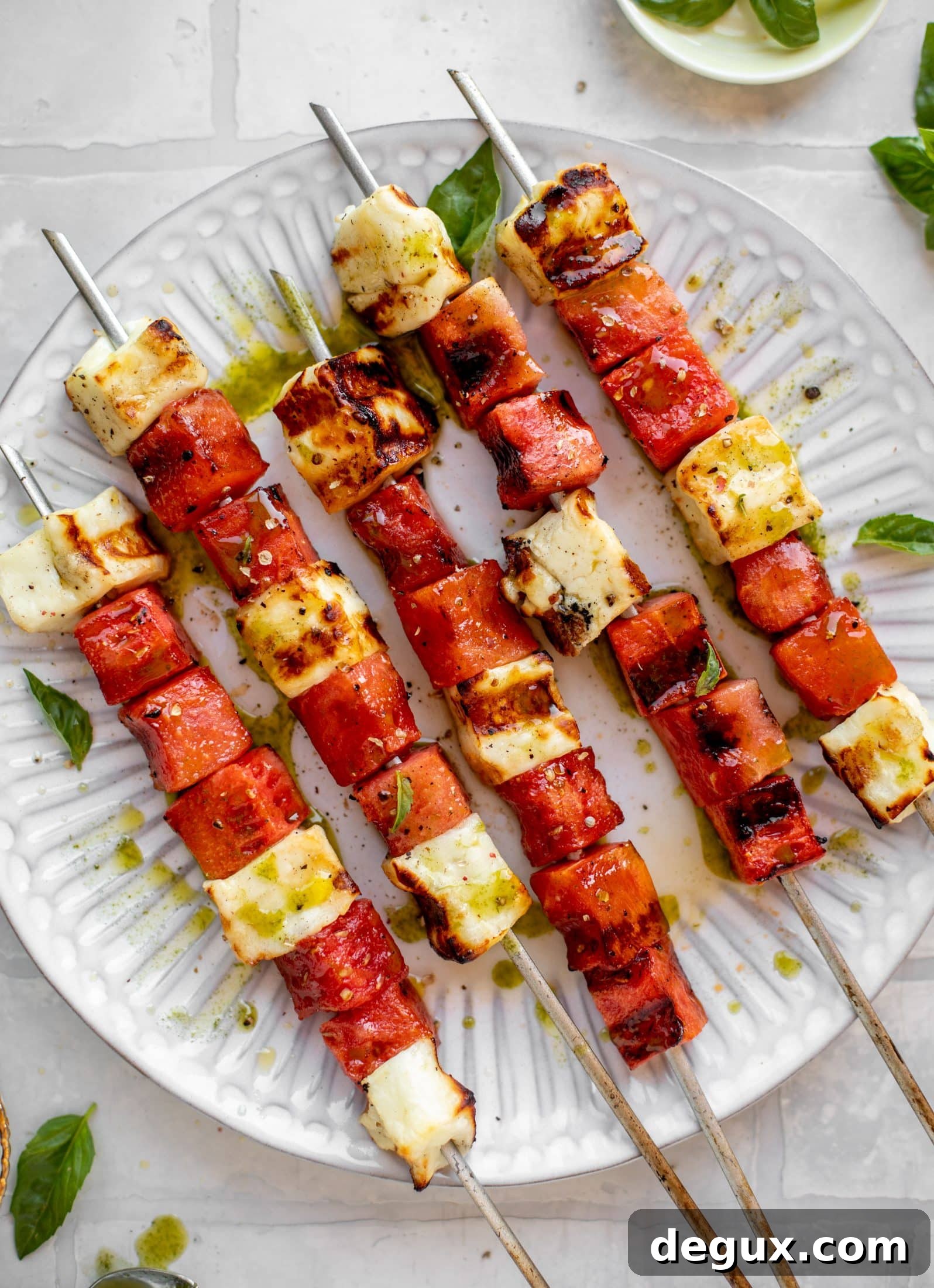 grilled watermelon halloumi skewers with mint basil oil