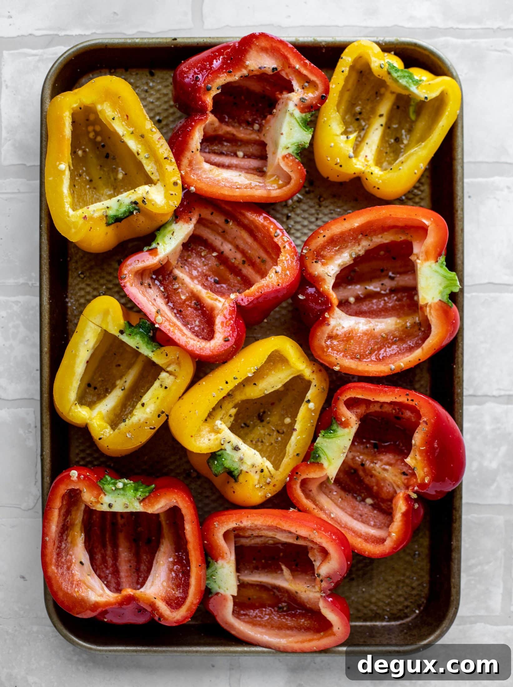 halved bell peppers ready for the grill