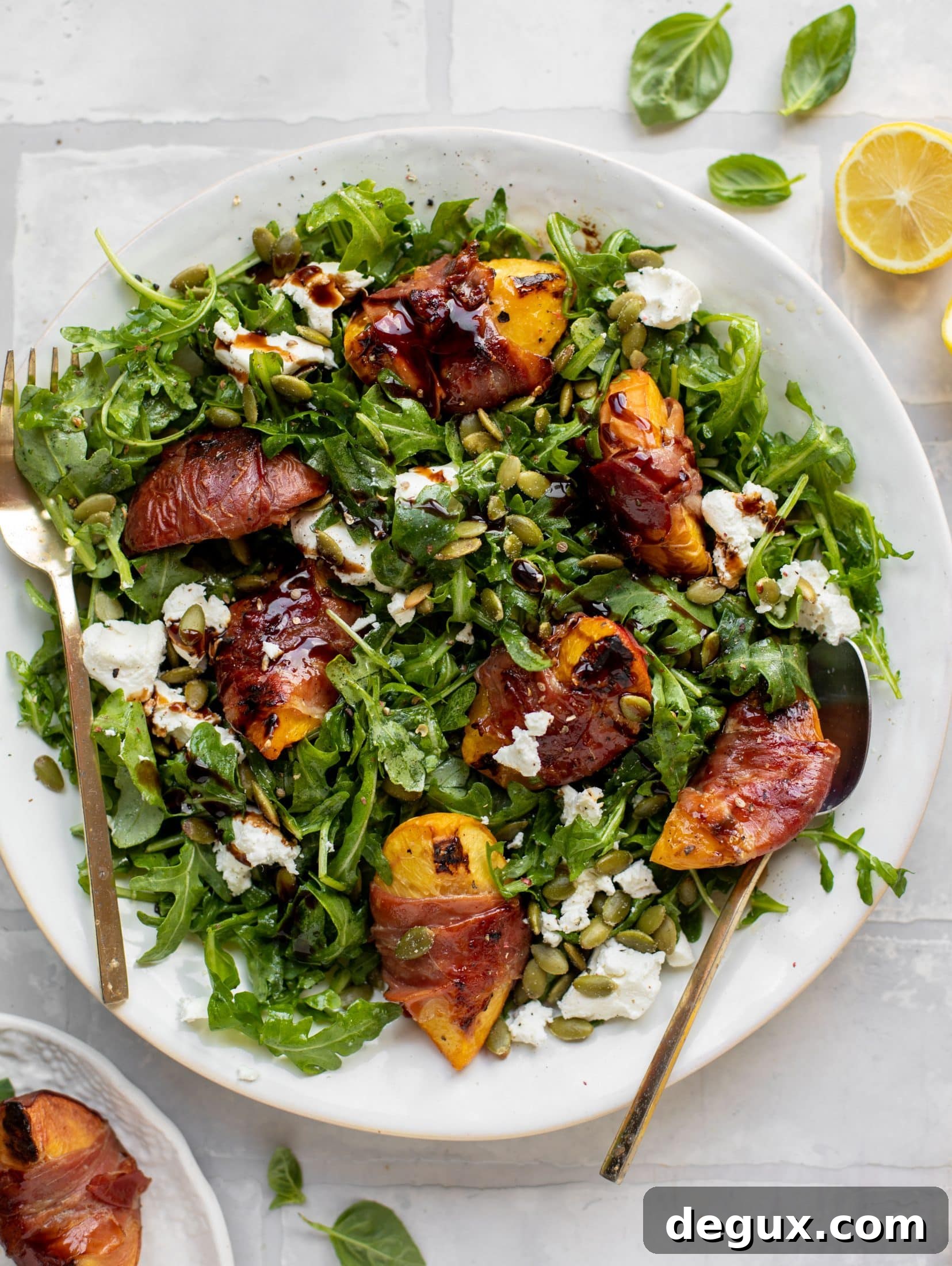 Grilled Prosciutto-Wrapped Peaches with Arugula and Goat Cheese 11 grilled prosciutto wrapped peaches with arugula and goat cheese