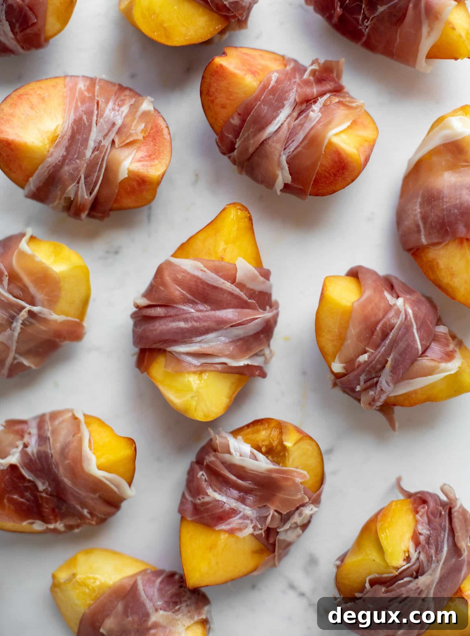 Grilled Prosciutto-Wrapped Peaches with Arugula and Goat Cheese 3 peaches wrapped in prosciutto