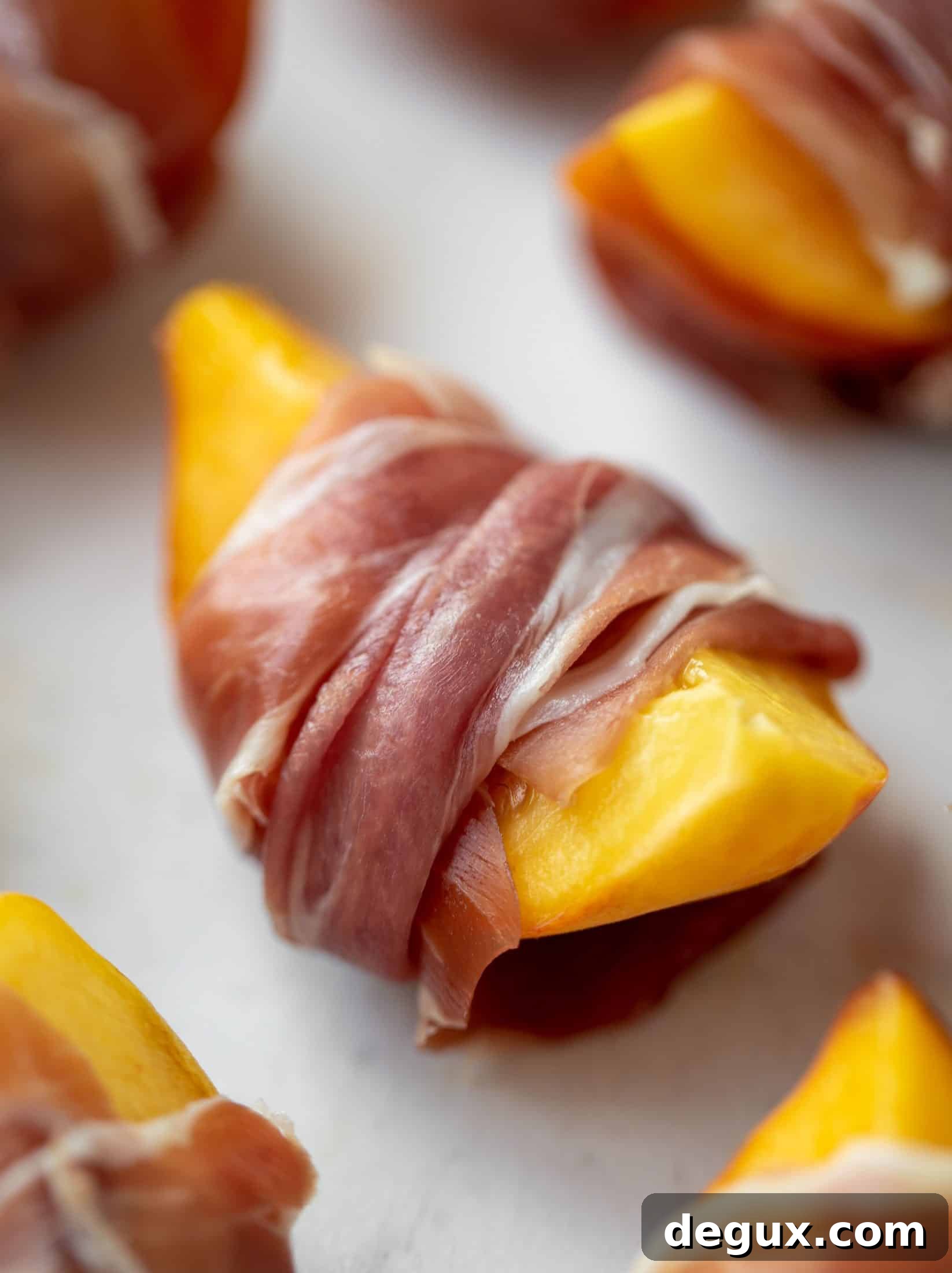 Grilled Prosciutto-Wrapped Peaches with Arugula and Goat Cheese 4 prosciutto wrapped peaches