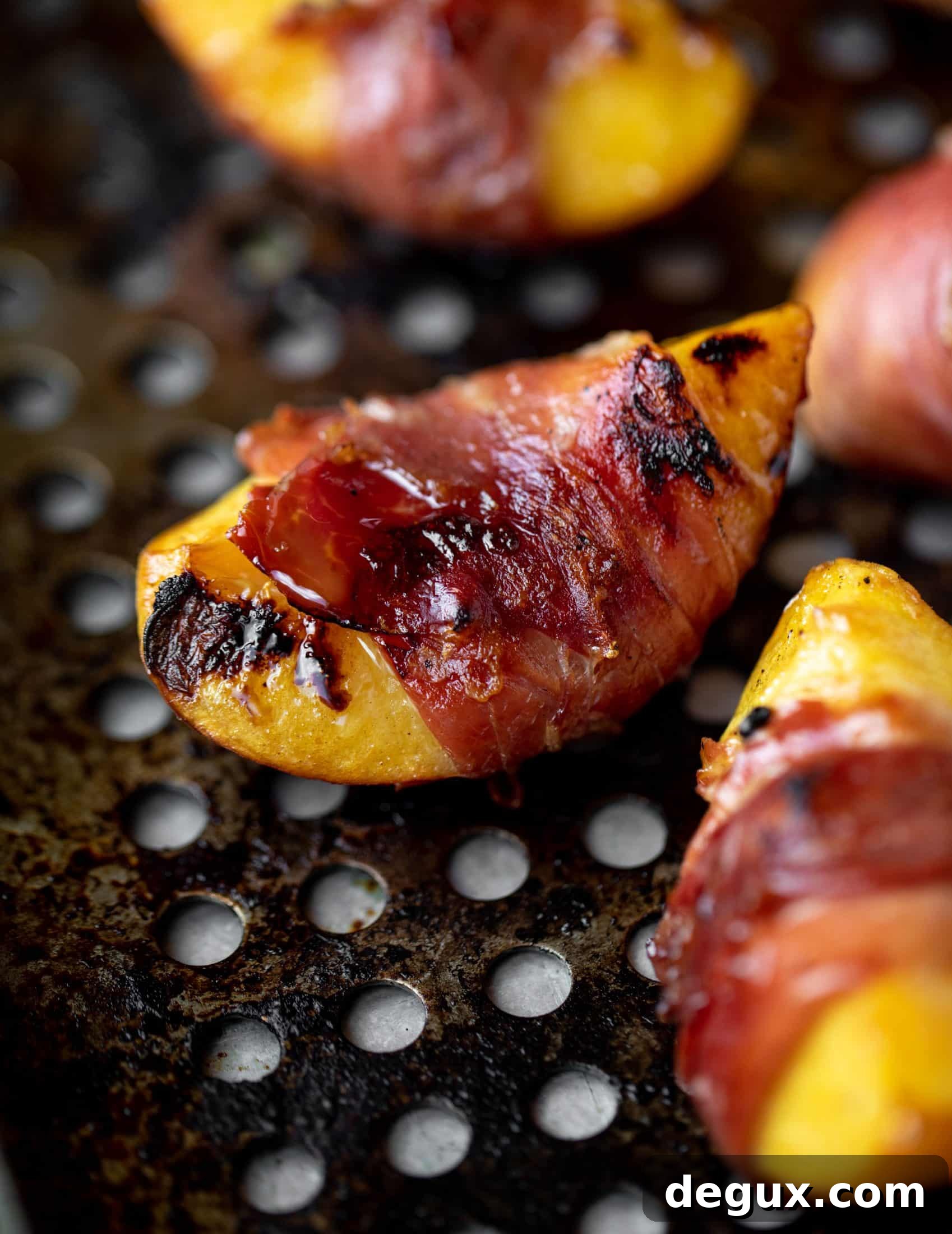 Grilled Prosciutto-Wrapped Peaches with Arugula and Goat Cheese 6 crispy prosciutto wrapped peaches