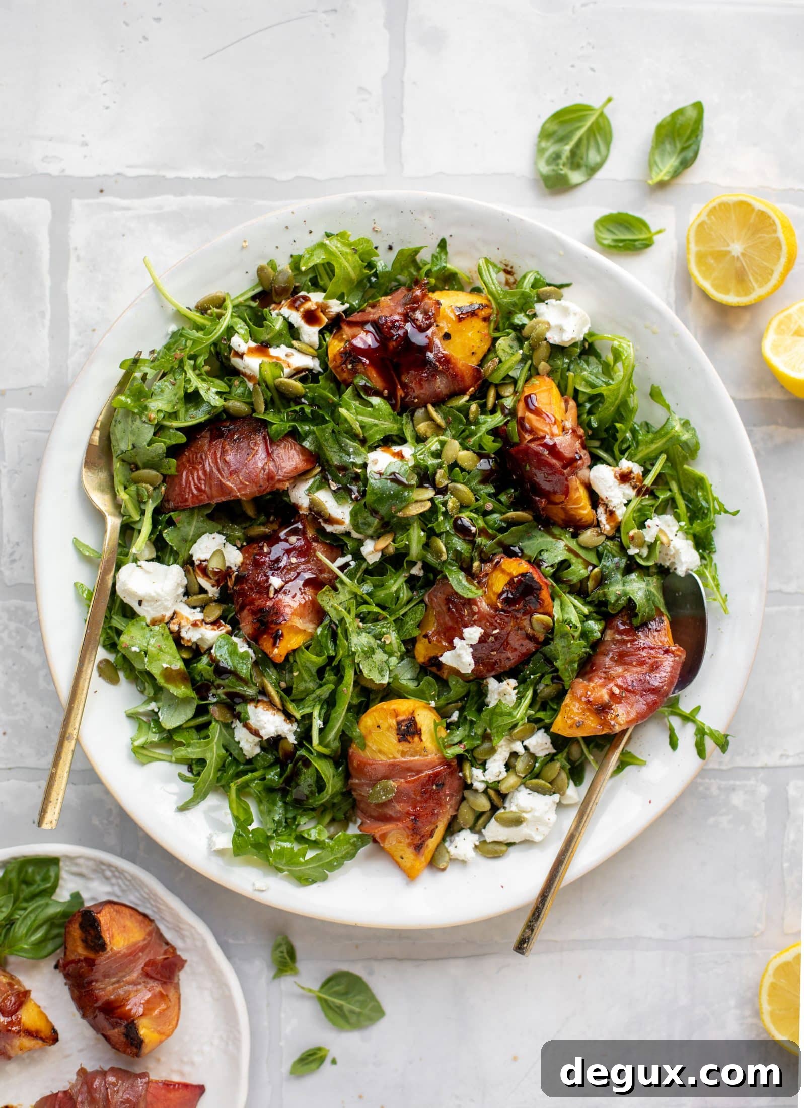 Grilled Prosciutto-Wrapped Peaches with Arugula and Goat Cheese 9 grilled prosciutto wrapped peaches with arugula and goat cheese