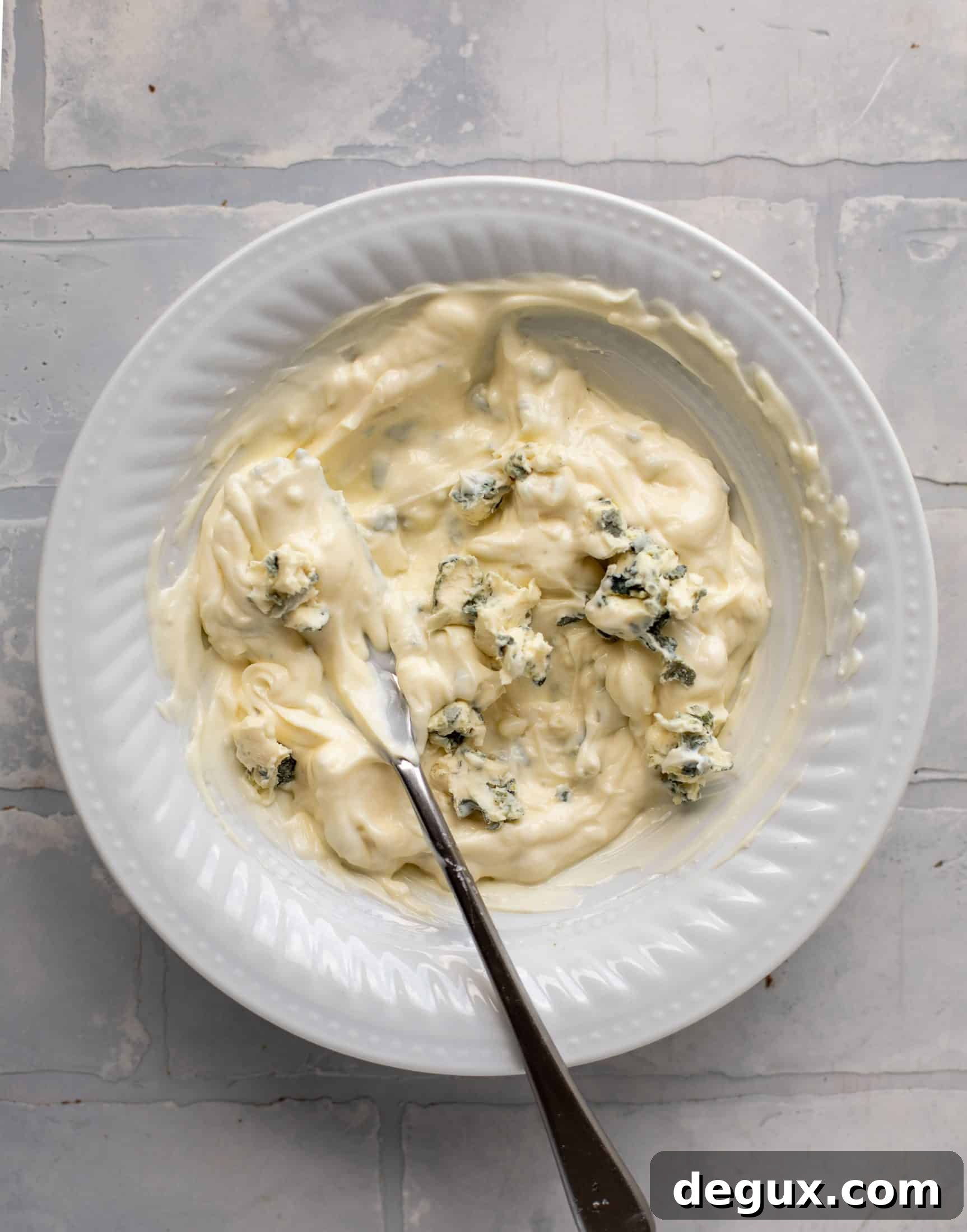crumbled blue cheese in mayo