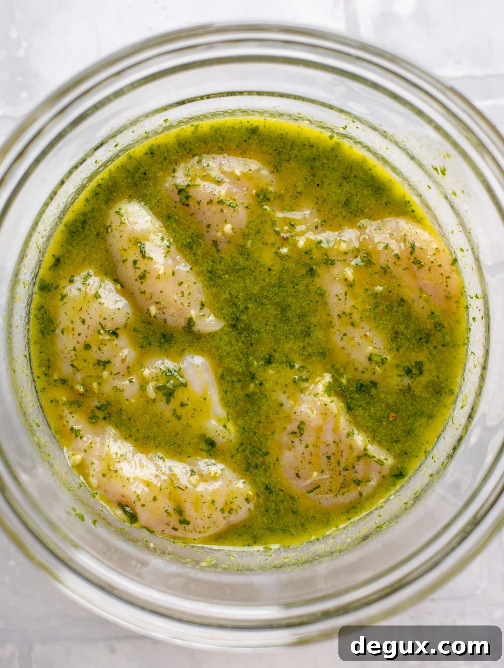 Grilled Cilantro-Lime Chicken with Fresh Peach Pico de Gallo 4 chicken marinating in cilantro lime dressing